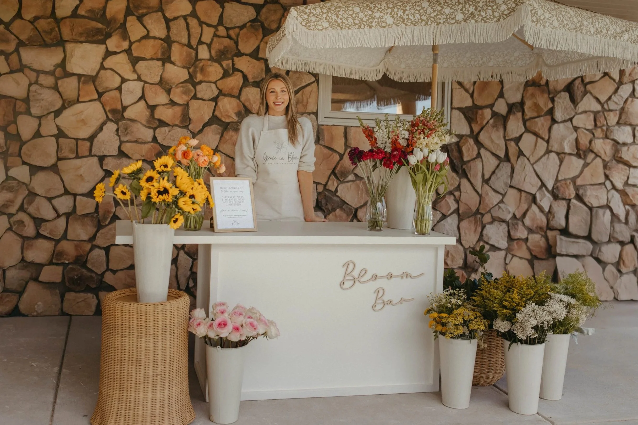 A beautifully styled Bloom Bar by Grace in Bloom Floral Design, featuring premium seasonal flowers and a custom flower cart for weddings, bridal showers, baby showers, and special events throughout Denver and Colorado.