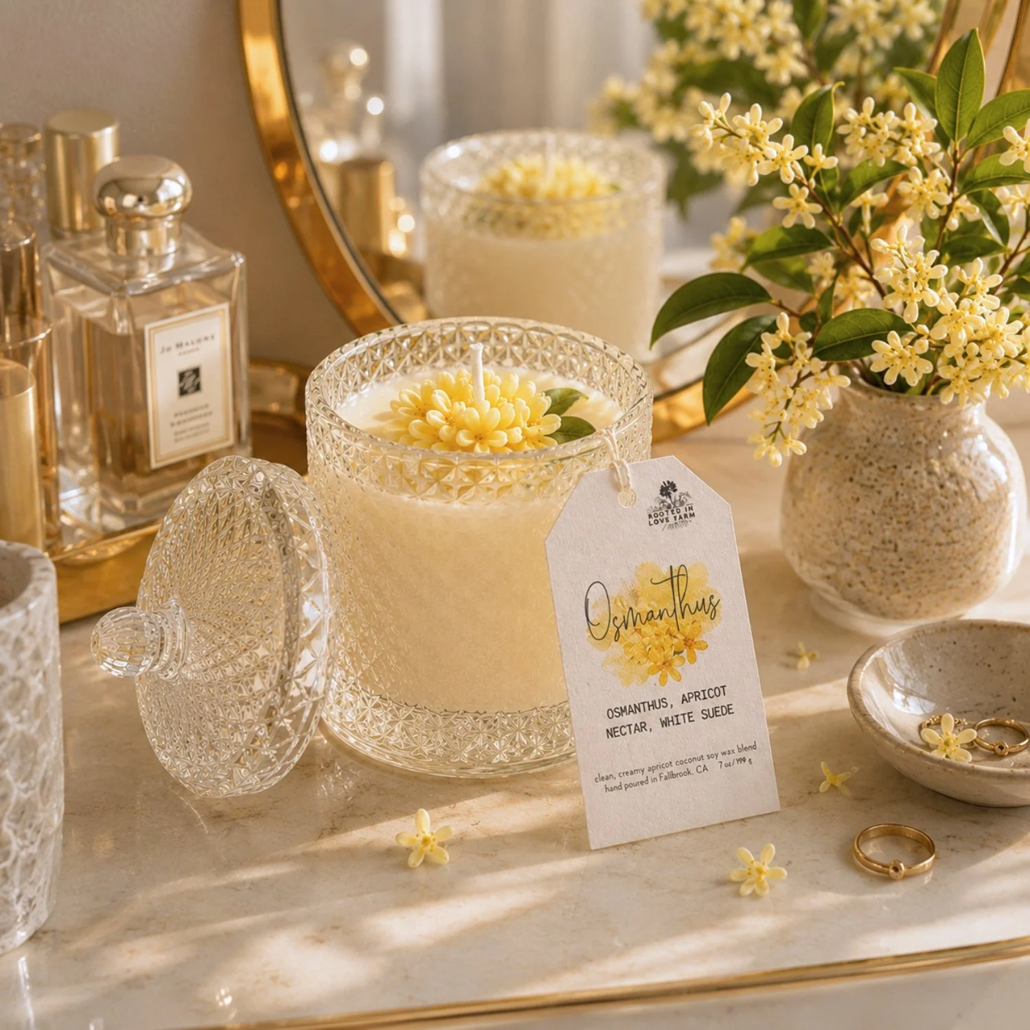 Osmanthus 7 oz with lid leaning on woman's vanity.jpg