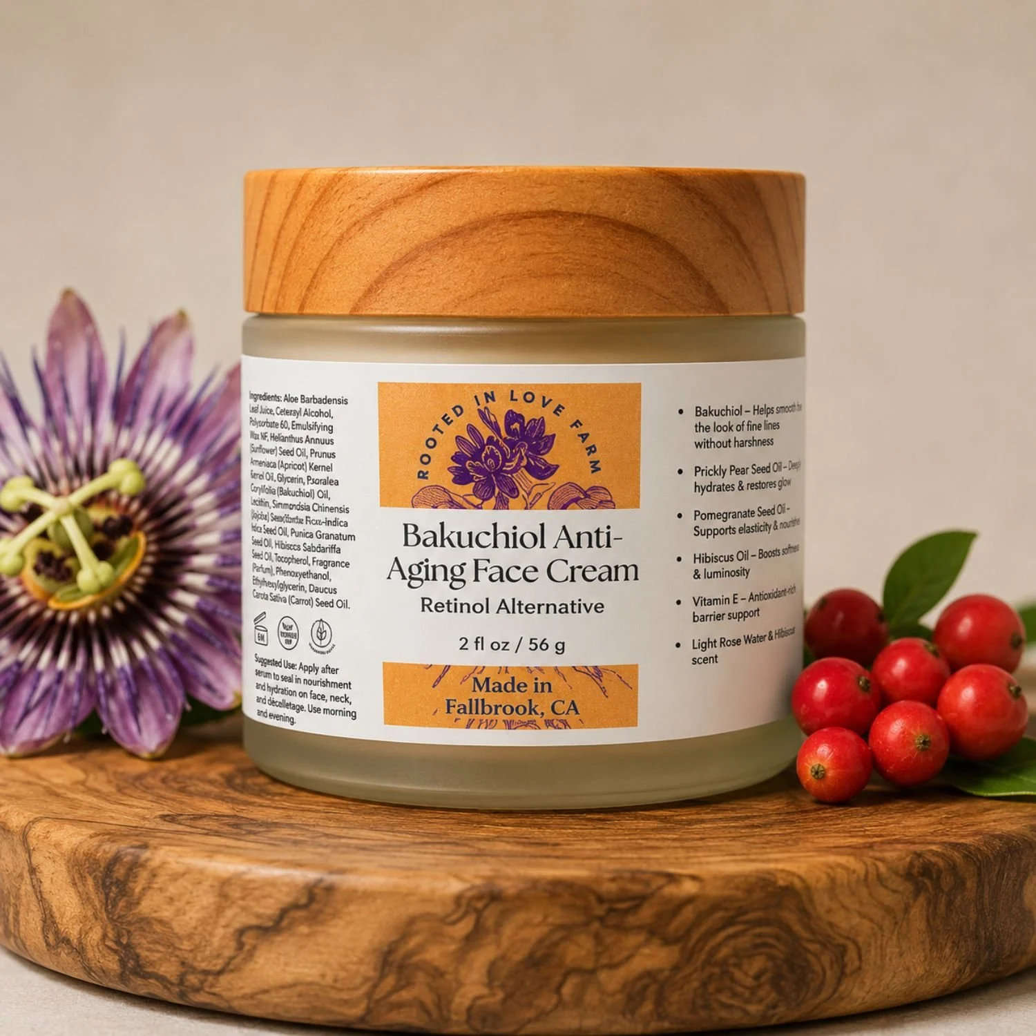 Bakuchiol face cream close up on wooden plate with botanicals.jpg