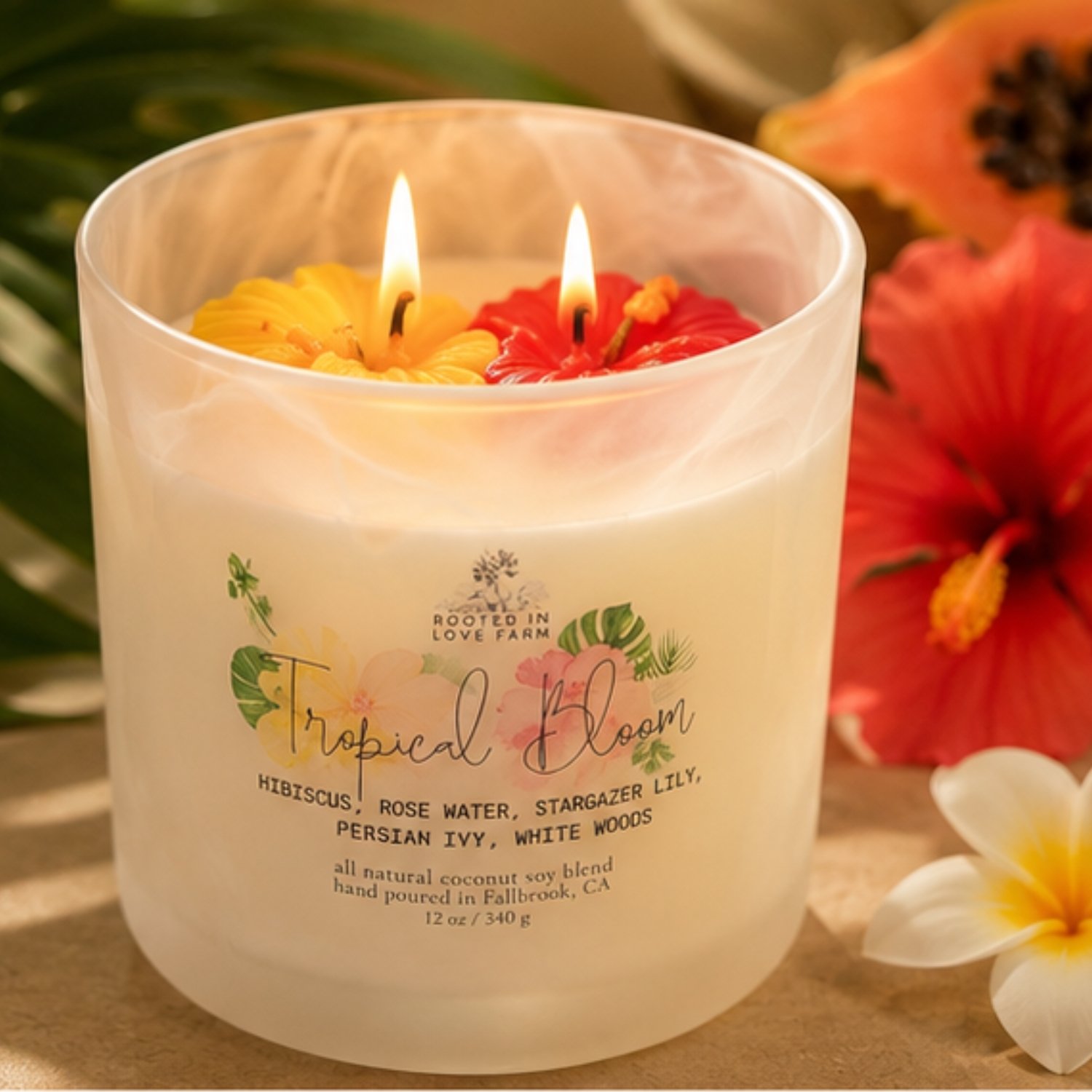 Tropical Bloom 12 oz lit with flowers.jpg