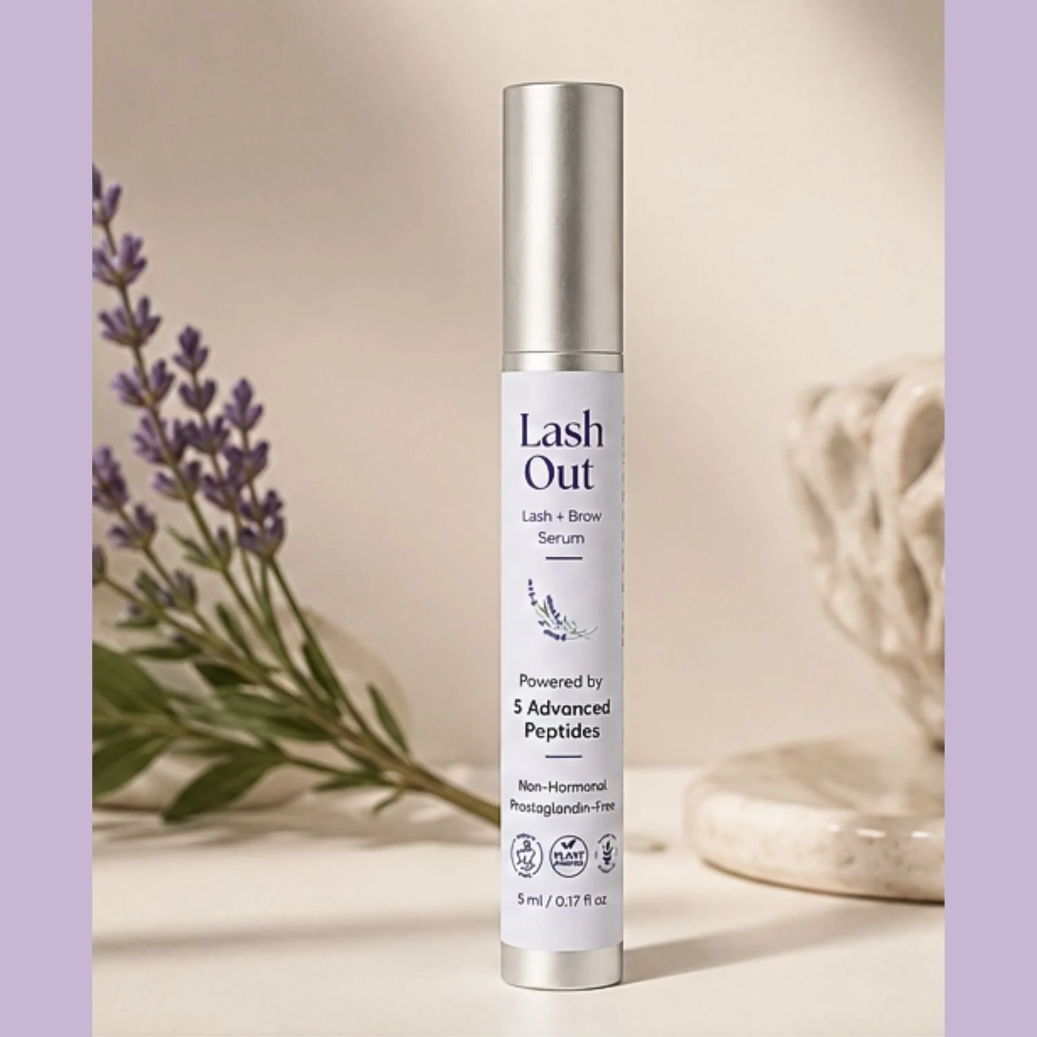 Lash Out Lash Serum front view with lavender in background.jpg