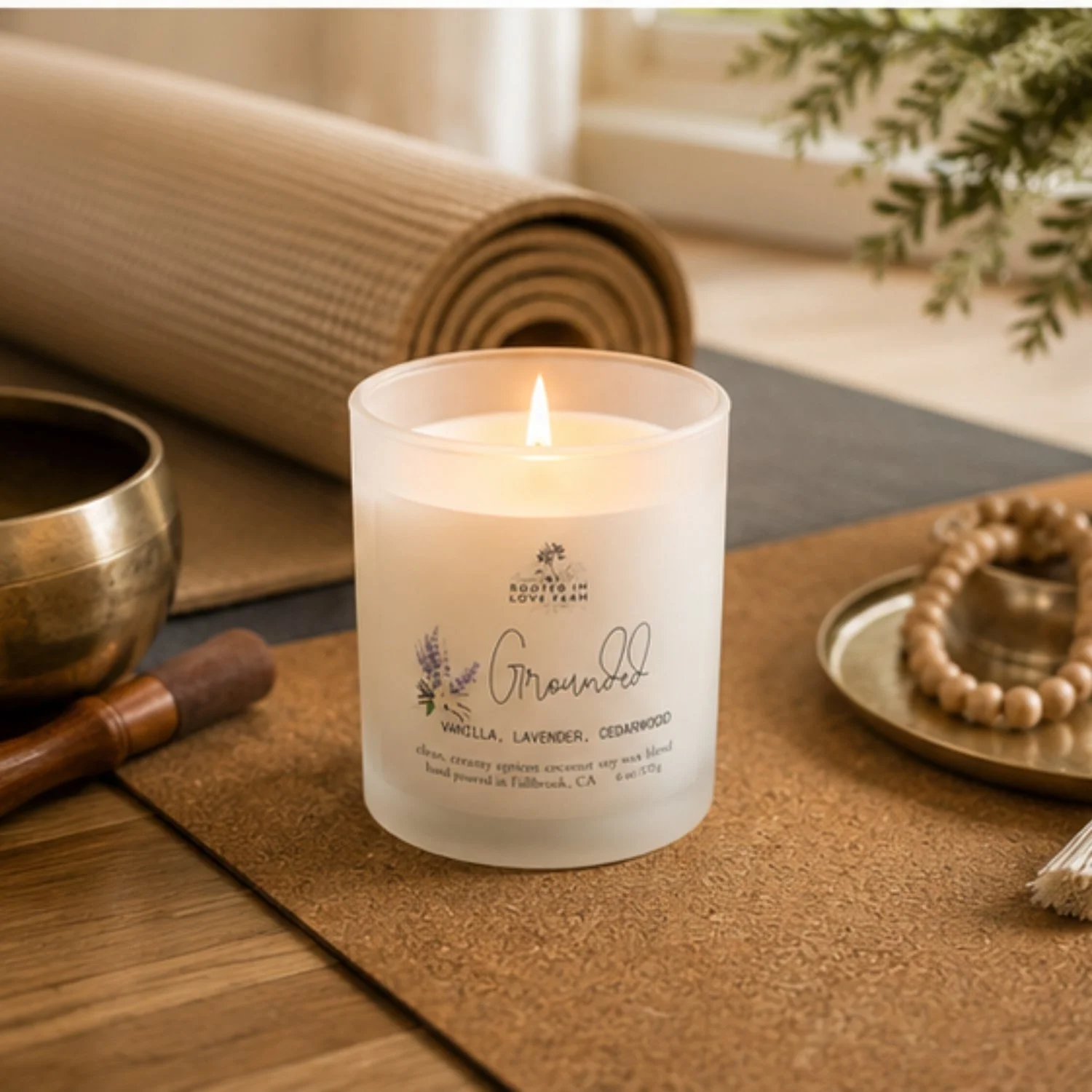 Grounded 6 oz lit no lid in yoga setting.jpg