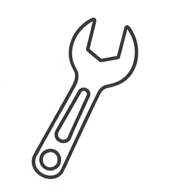 Työkalupakki sisältää koukun, ruuvimeisselin ja harjan, ja siihen on asetettu seteli rahaa.