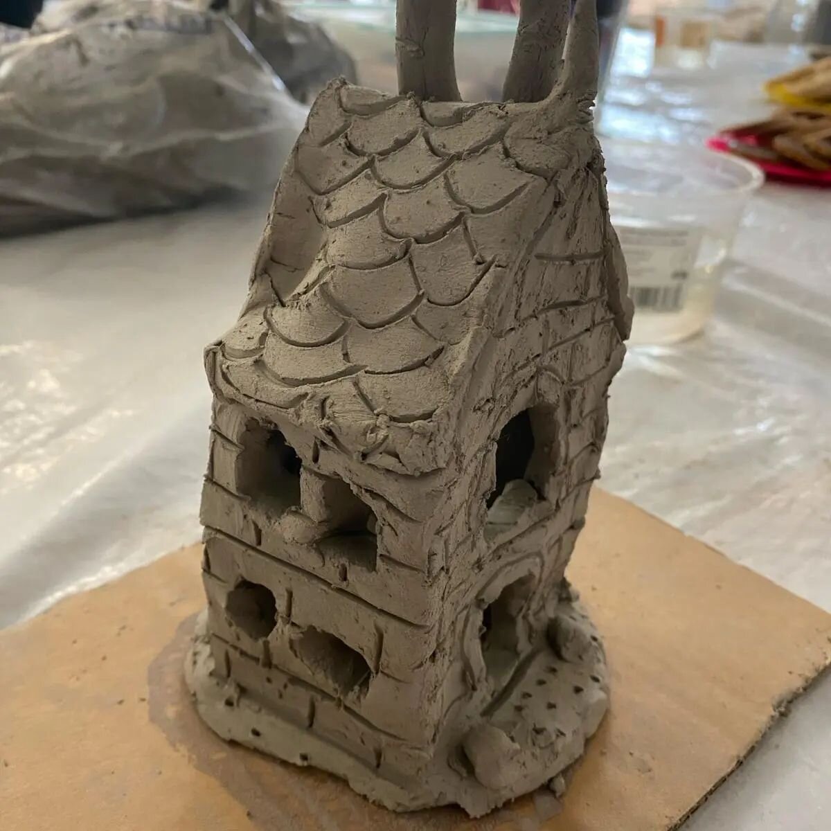 Sam has been doing some beautiful work with her Walk and draw group about the idea of home. The group is a real mix of people who come from over 10 different countries and the buildings they chose to make with clay really reflect that.

It led to som