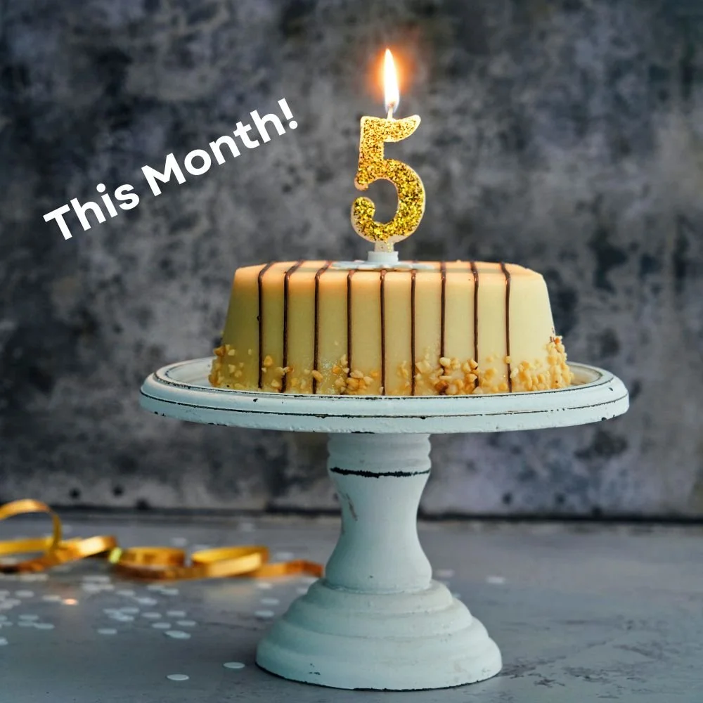 Swarm recruitment is 5 so there is a caramel birthday cake on a white stand with a gold no. 5 candle lit