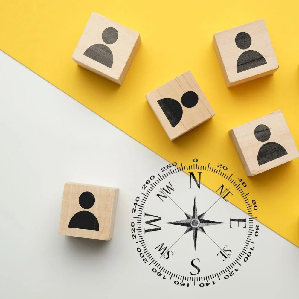 how to navigate staffing depicted here by a compass and blocks with human graphics on