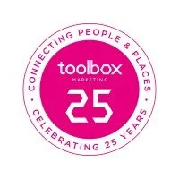 Circular logo with pink background and white text, celebrating 25 years of Toolbox Marketing with the slogan 'Connecting People & Places'.