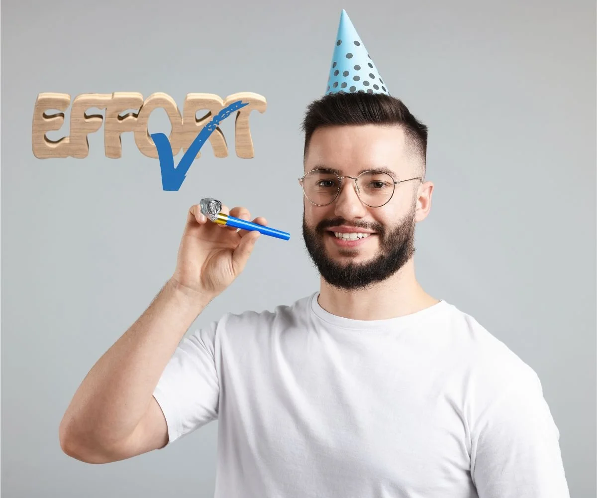 Stay Resilient: a dark haired bearded man wearing a party hat and holding a party blower