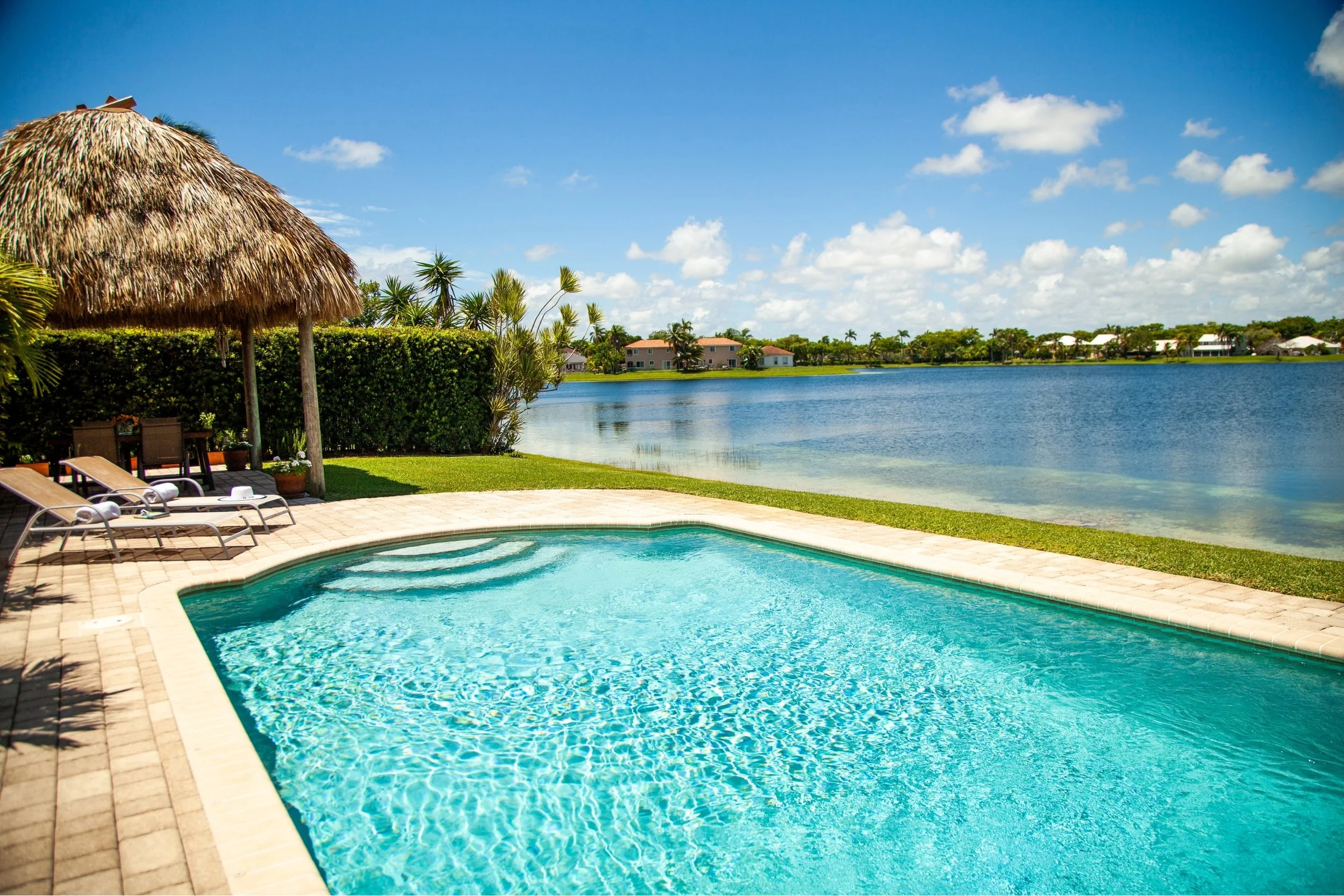 Lakefront home in Cutler Bay, Florida with a private pool overlooking the lake
