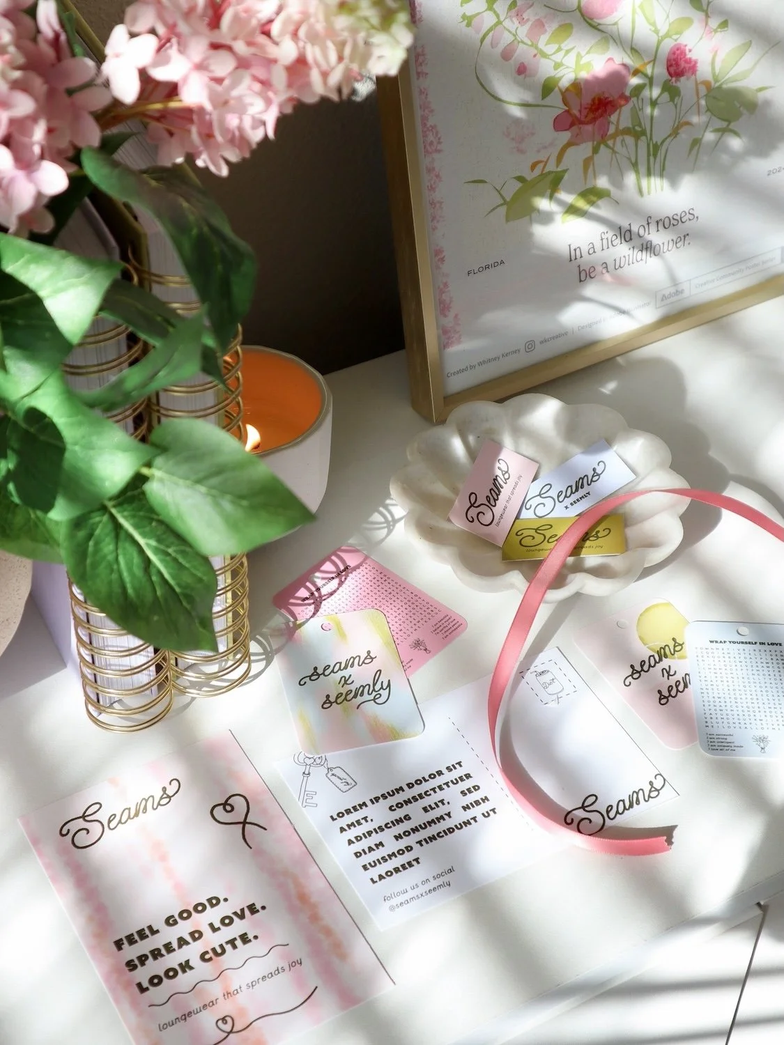 Hand-drawn brand marks for Seams x Seemly: thread heart, needle, bow, bouquet, key and Jesus fish