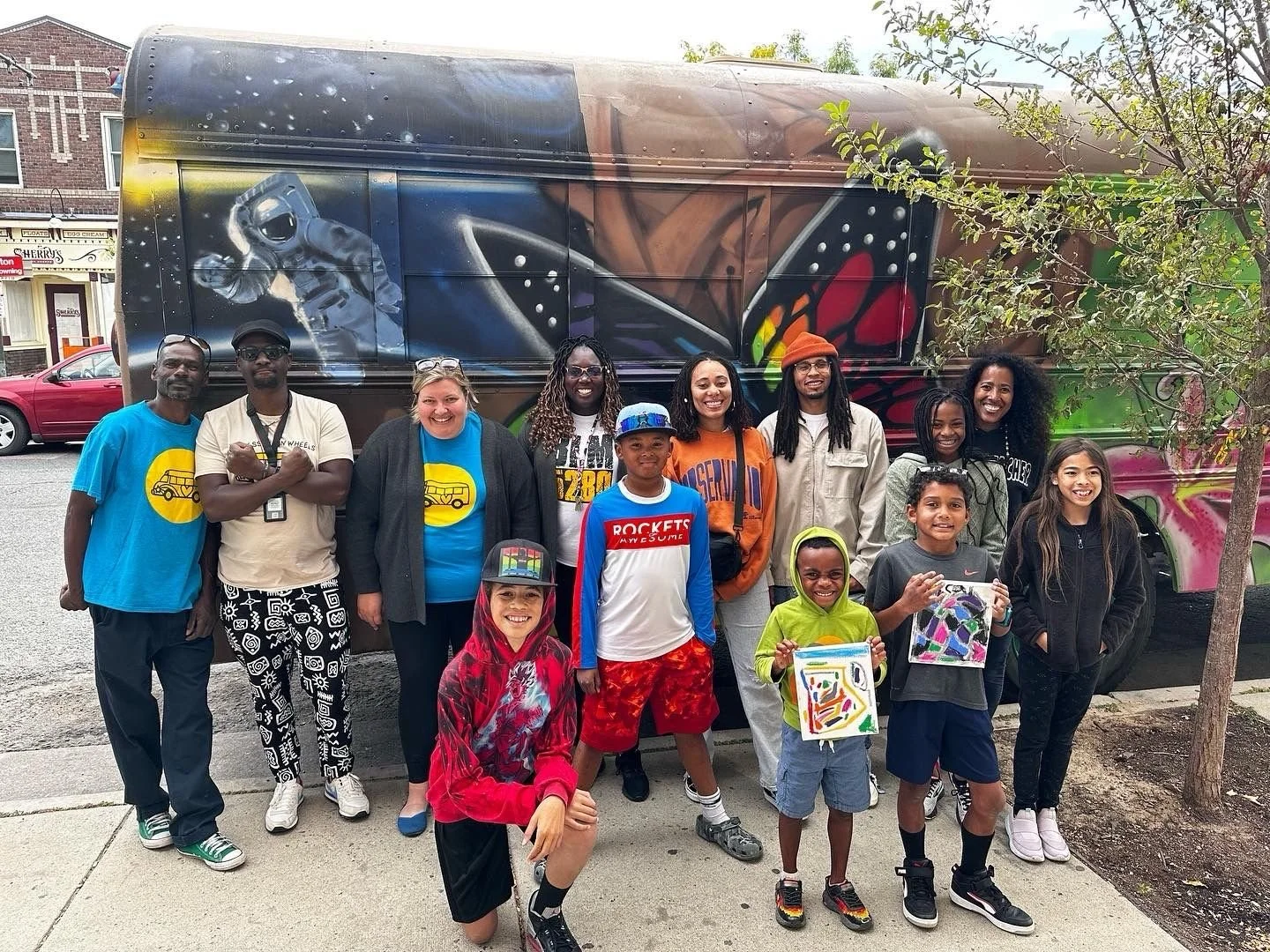 Kids in front of bus.jpeg