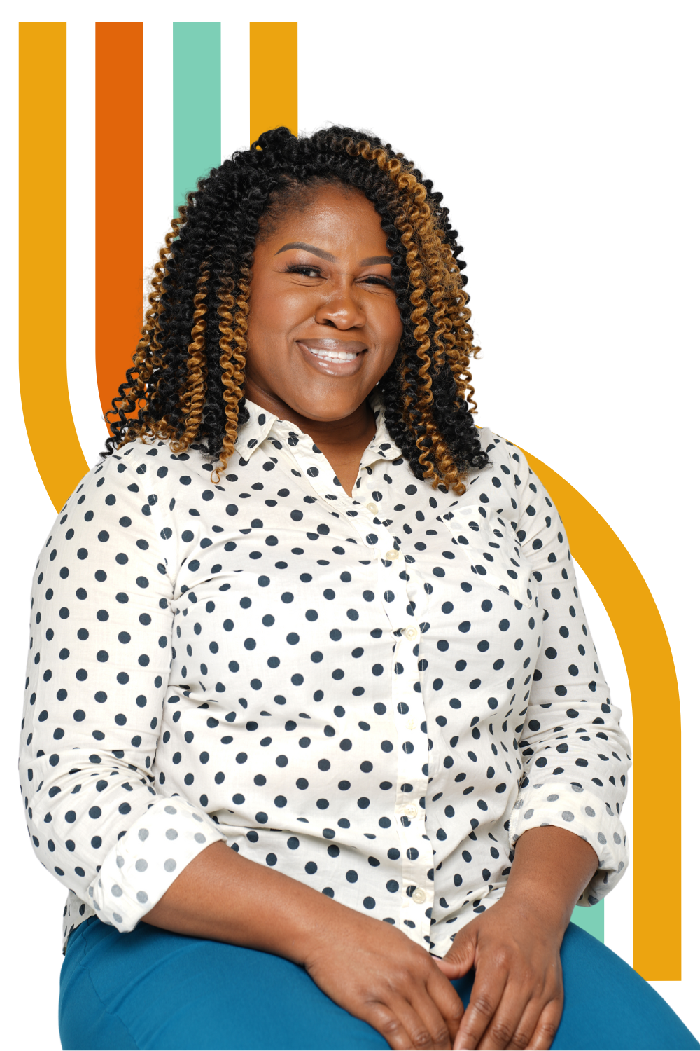 A woman with curly, two-tone hair smiling, wearing a white shirt with black polka dots and blue pants, against a colorful abstract background.