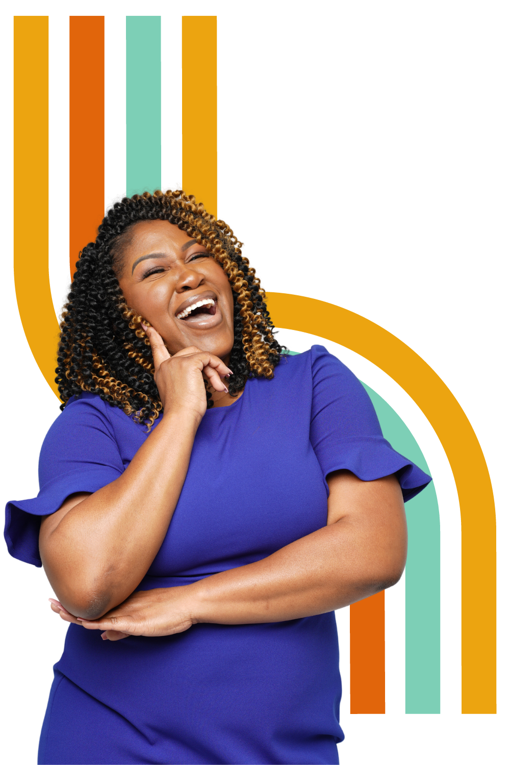 A woman with curly hair smiling and laughing, wearing a blue dress, may be sharing a joke or reacting happily.