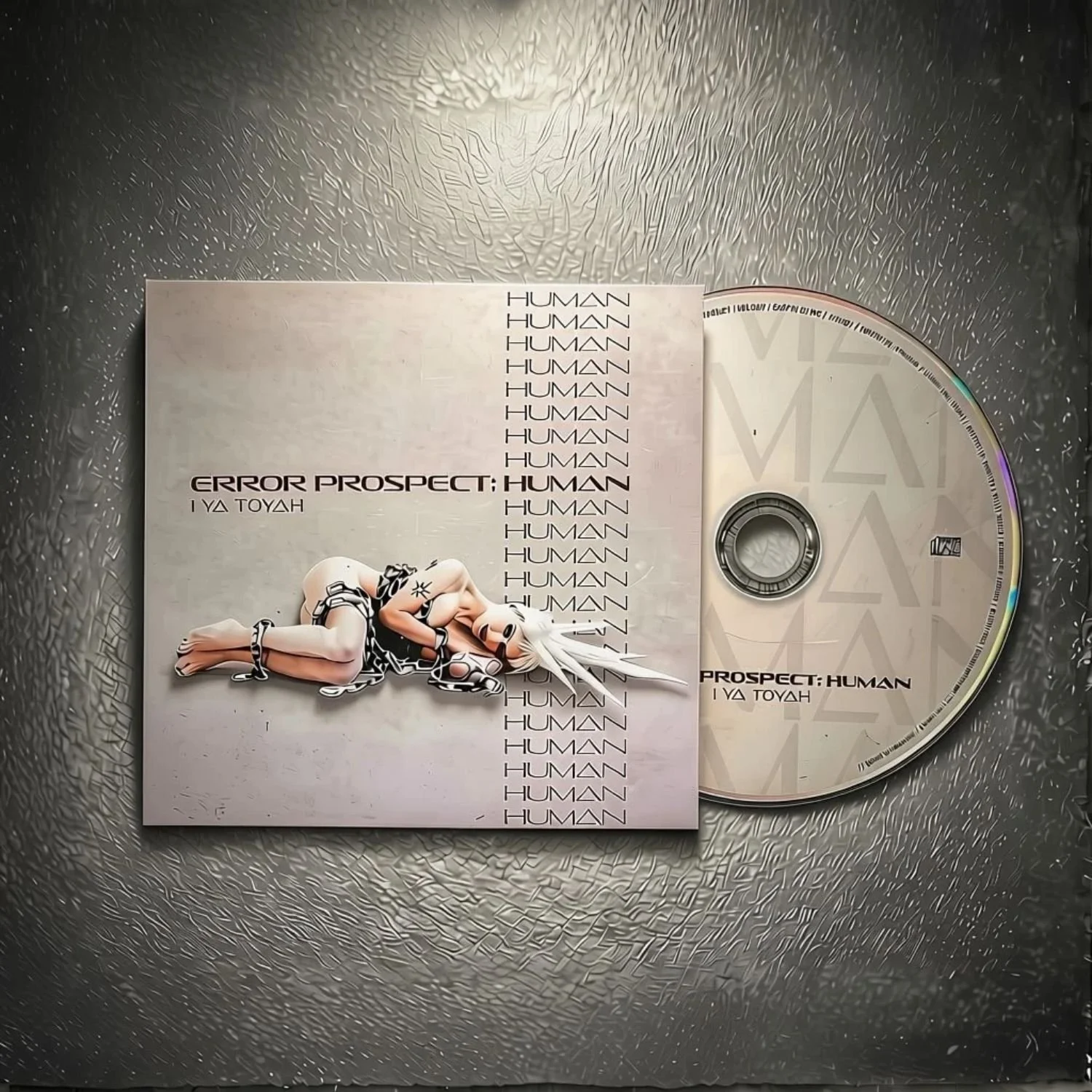 CD  Main Photo + ring studio table w light.jpg
