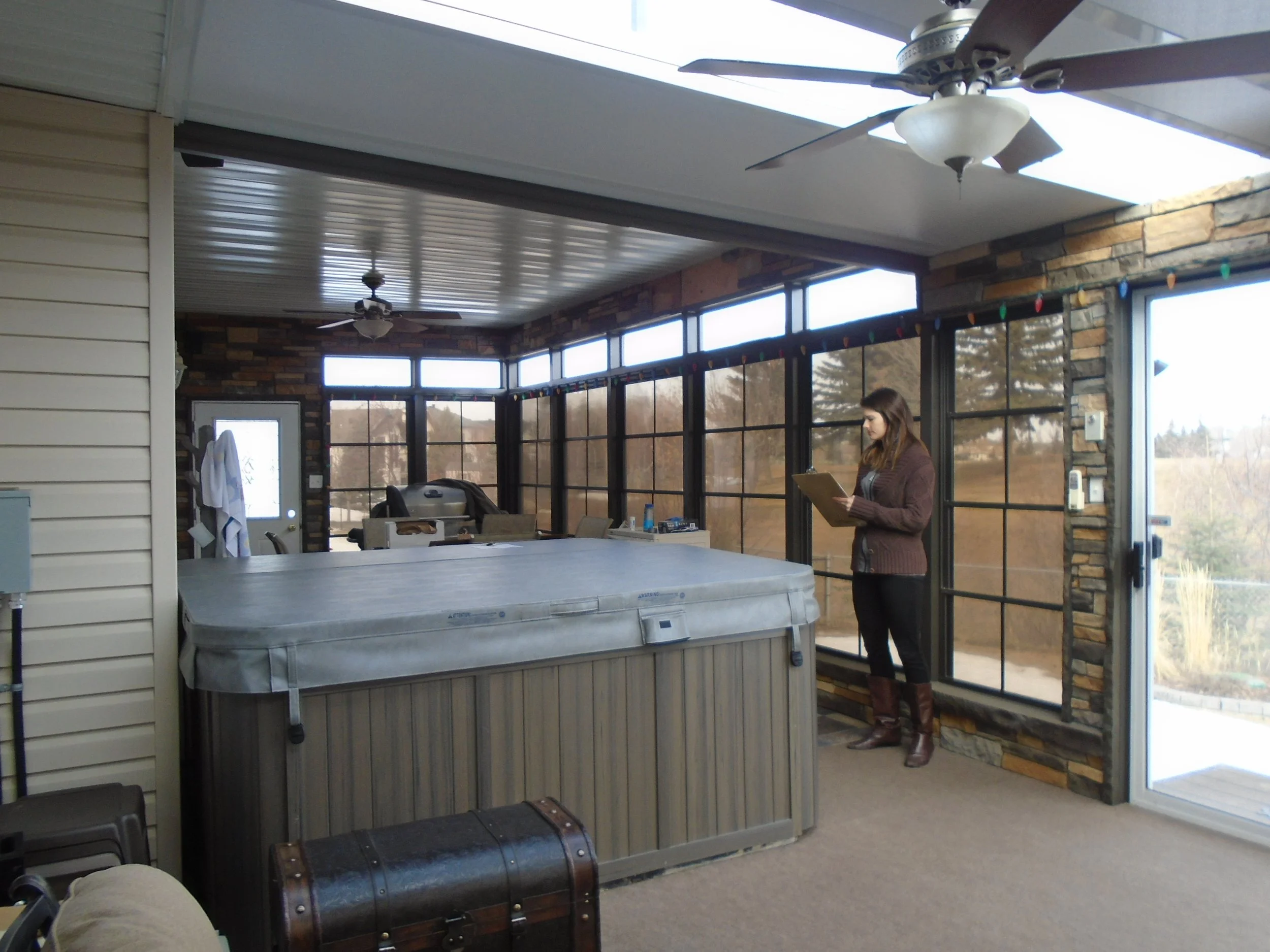 3 Season Sunroom with permanent foundation attached to the house.
