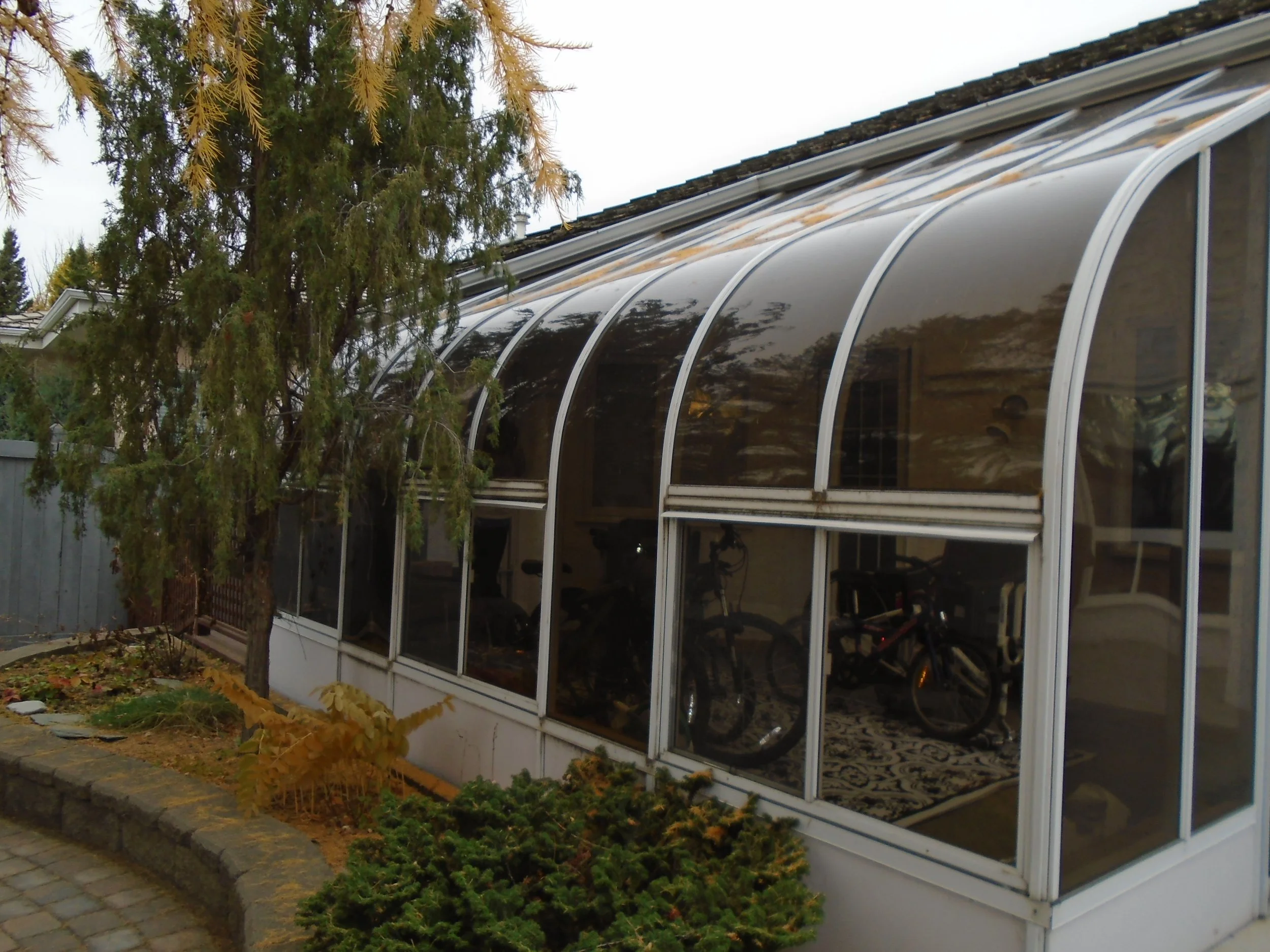 3 Season Sunroom with permanent foundation attached to the house.