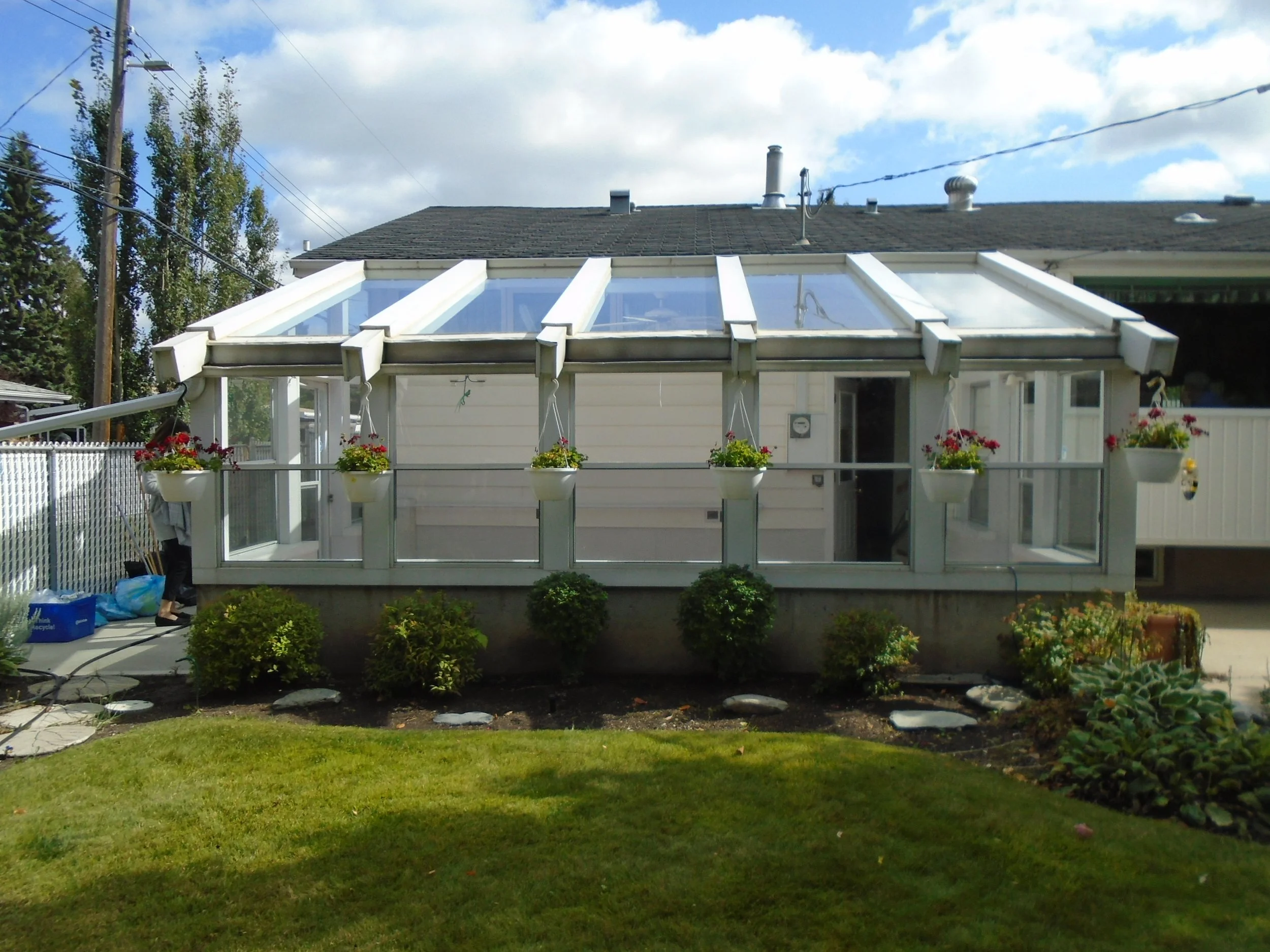 3 Season Sunroom with permanent foundation attached to the house.