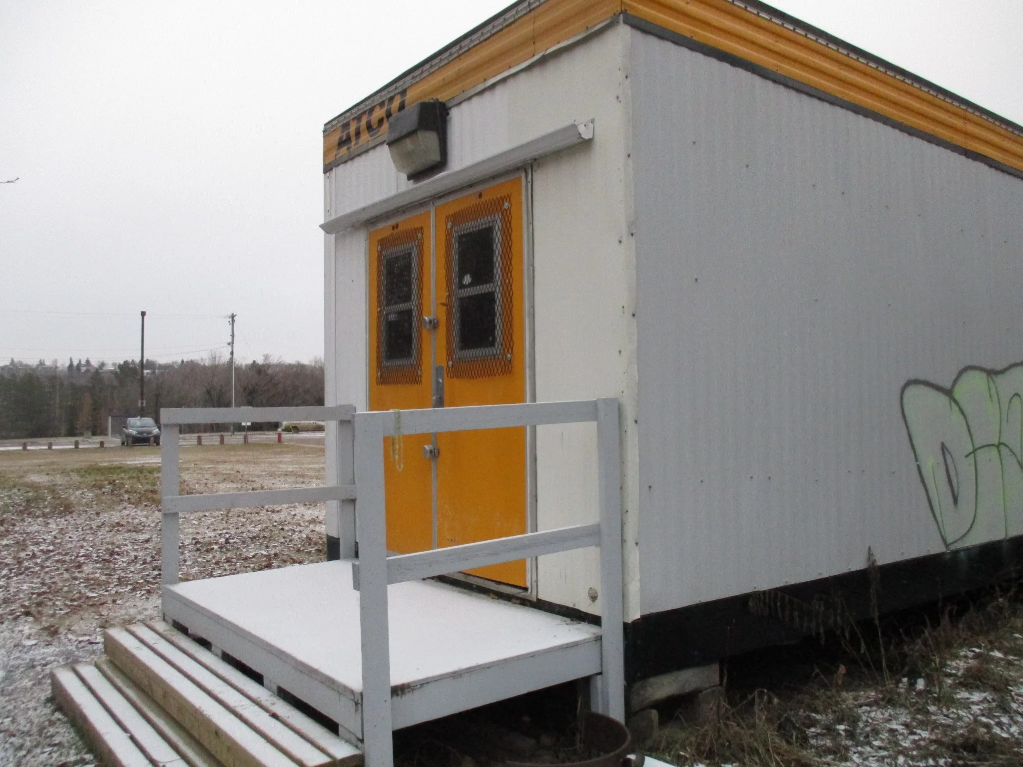 Mobile trailer requires development permit and building permit.