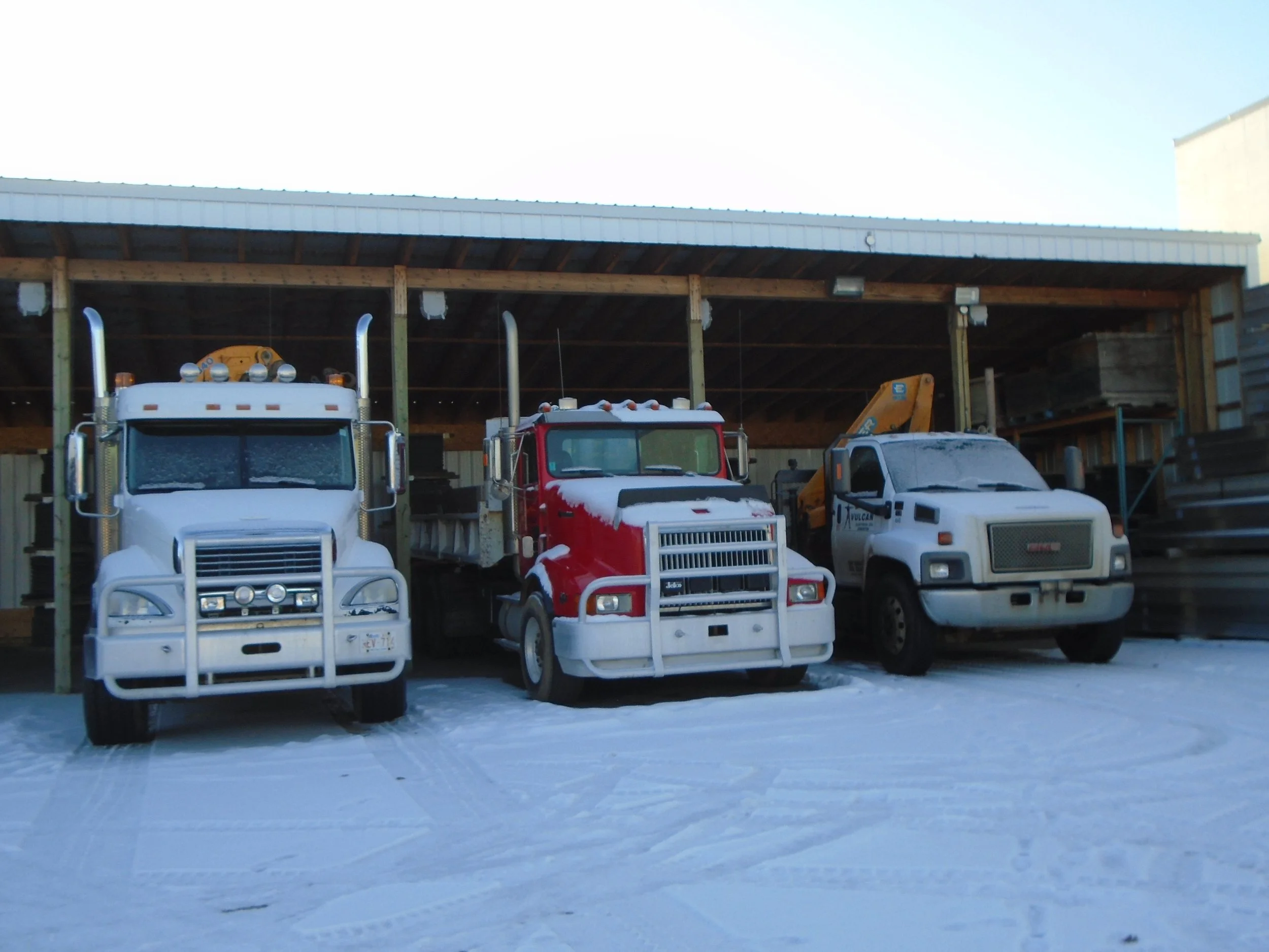 Cold storage lean-to requires development permit and building permit.