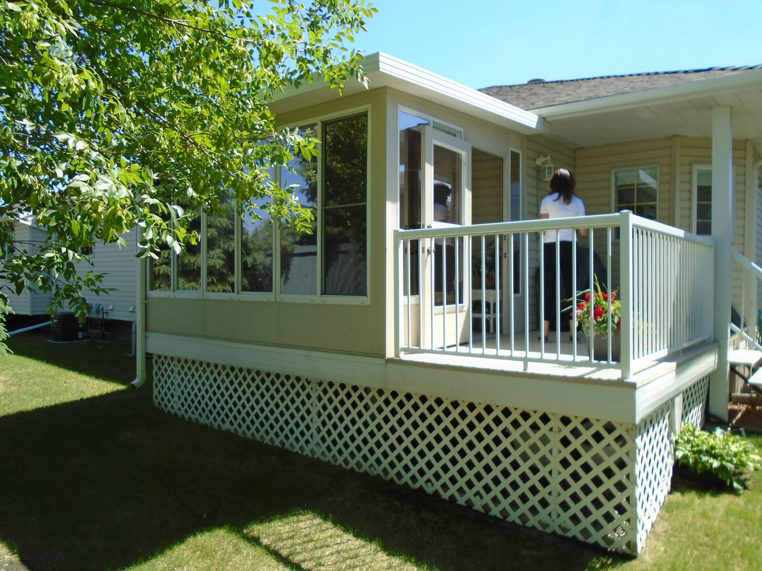 3 Season Sunroom with permanent foundation attached to the house.