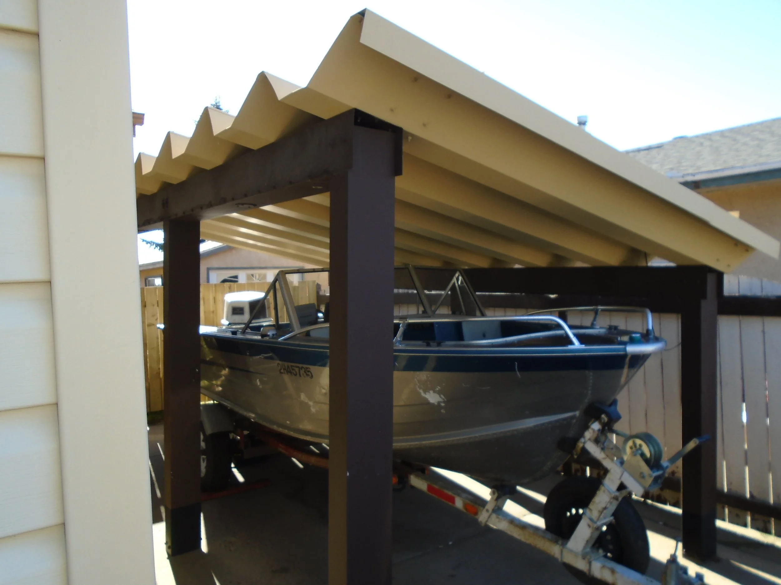 Outdoor lean-to requires Development Permit and Building Permit.