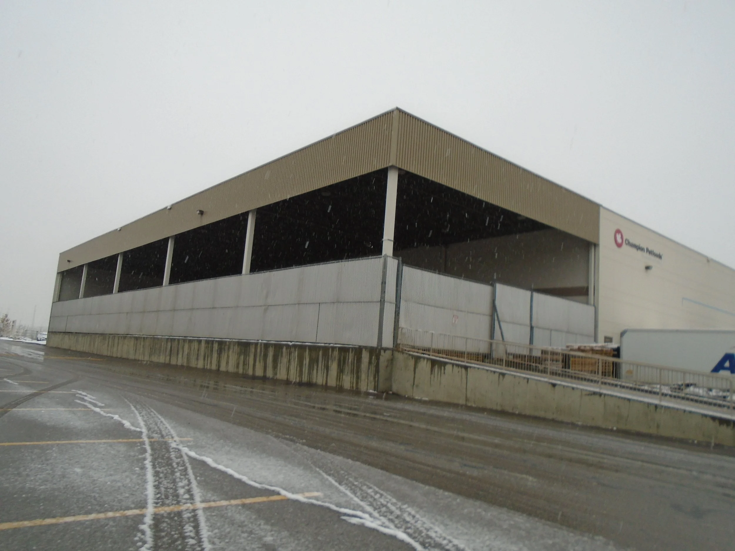 Cold storage addition requires development permit and building permit.