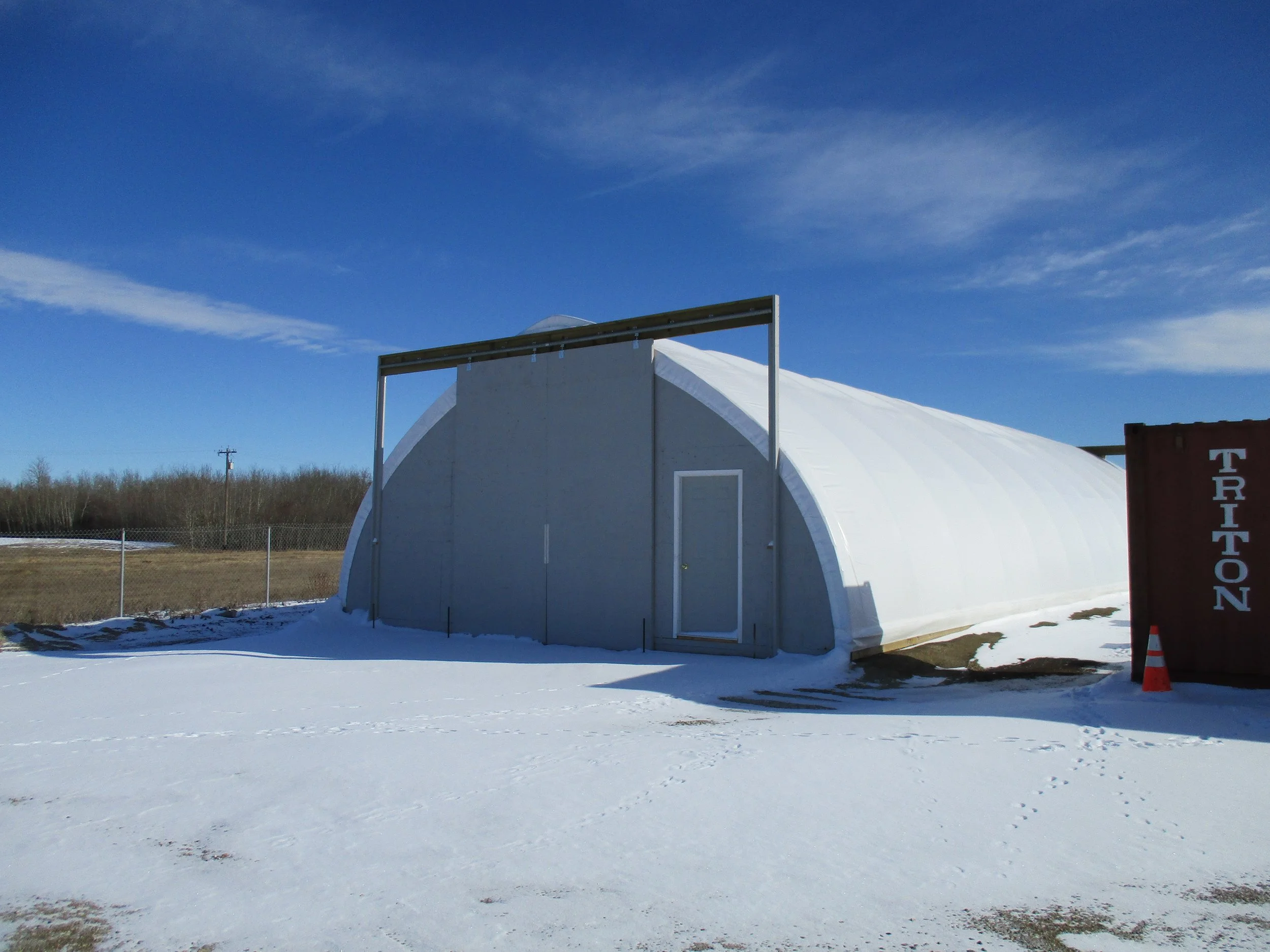 Heated quonset requires commercial development and building permit. 