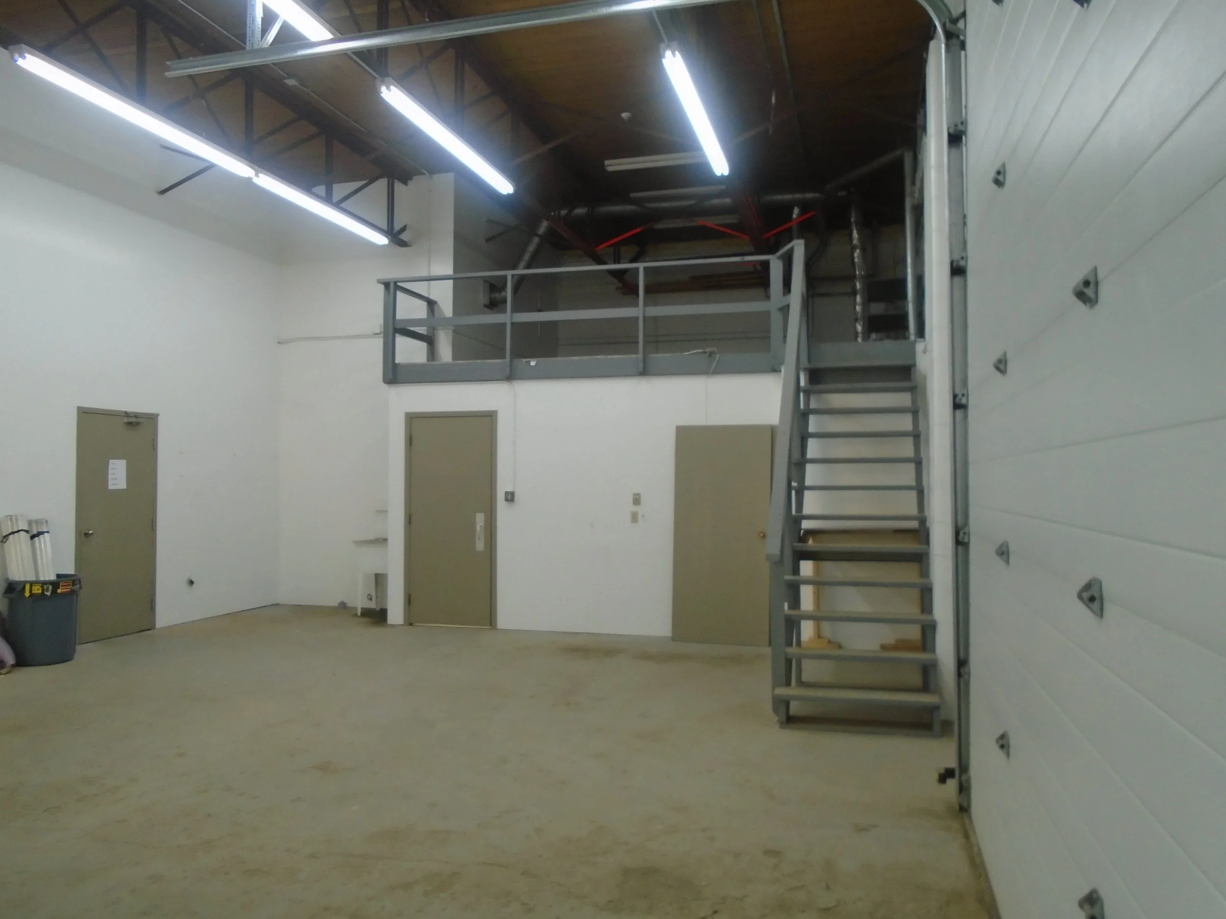 Commercial mezzanine requires development permit and building permit.