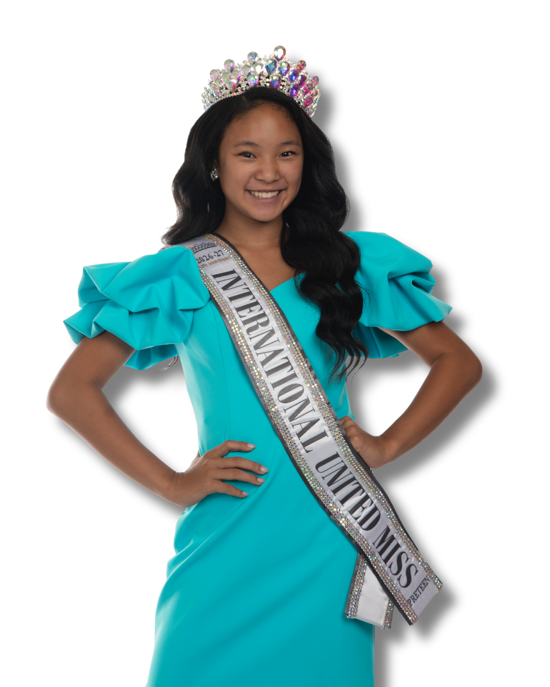 Young woman wearing a pink gown and tiara with a sash that reads 'International United Miss'.