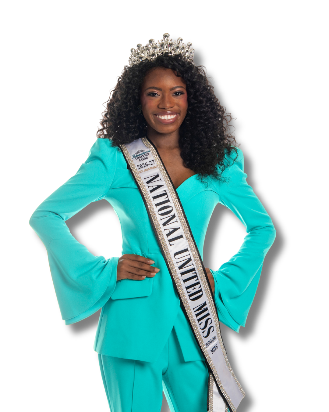 Young woman wearing a blue evening gown, a sash labeled 'National United Miss 2025-26,' and a sparkling tiara, smiling with hands on her hips.