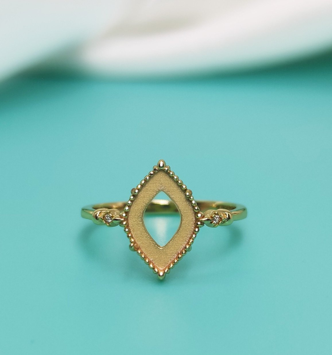 $100 - available in yellow gold