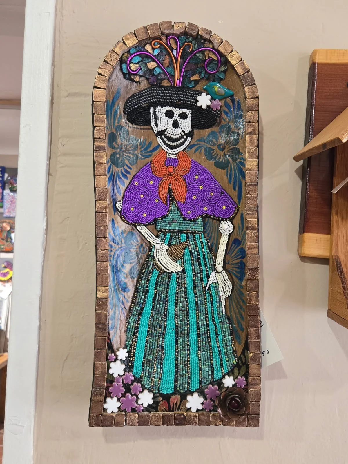 mosaic with found objects by Terry Wright