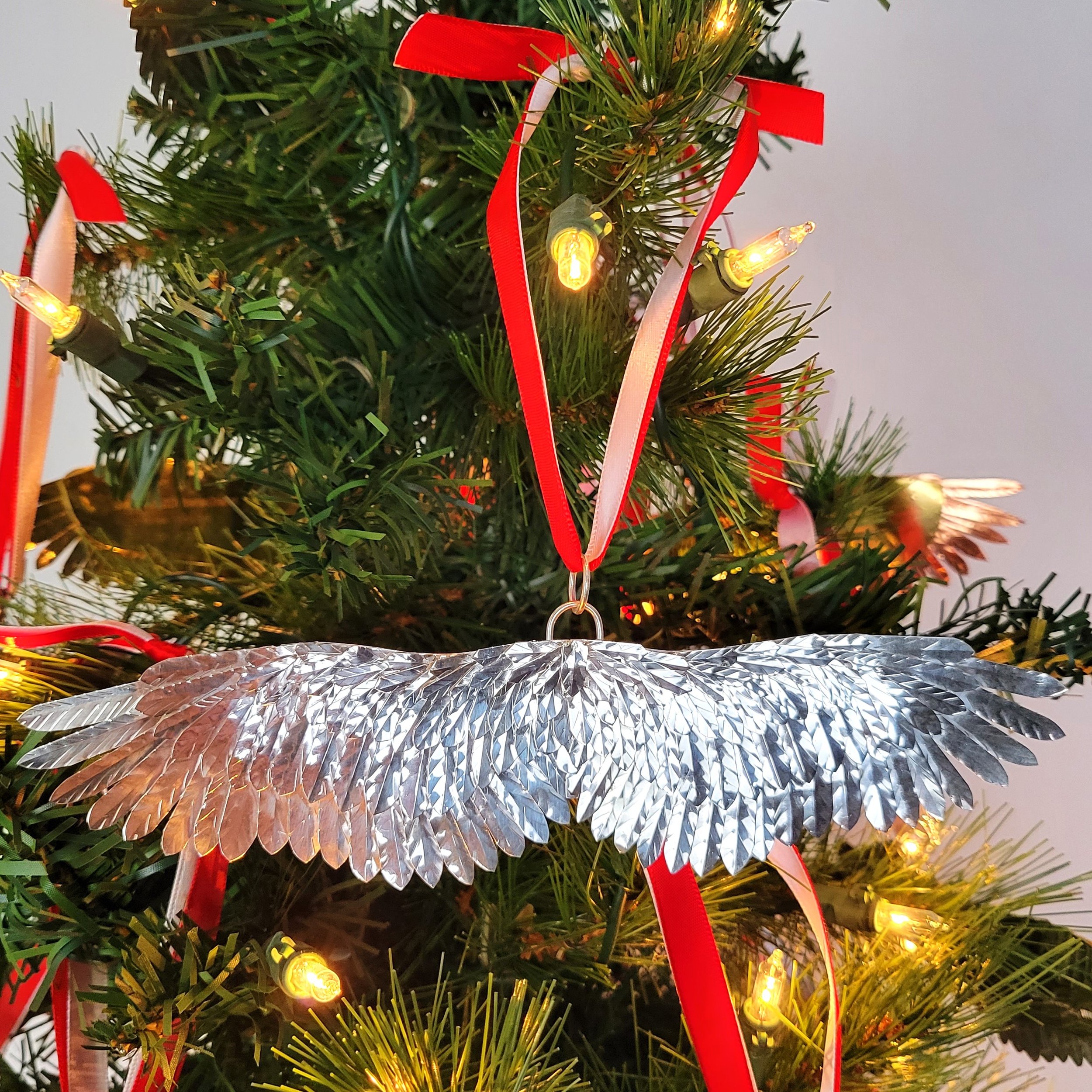 Handmade 2023 sterling silver Christmas ornament-full picture zoomed out.