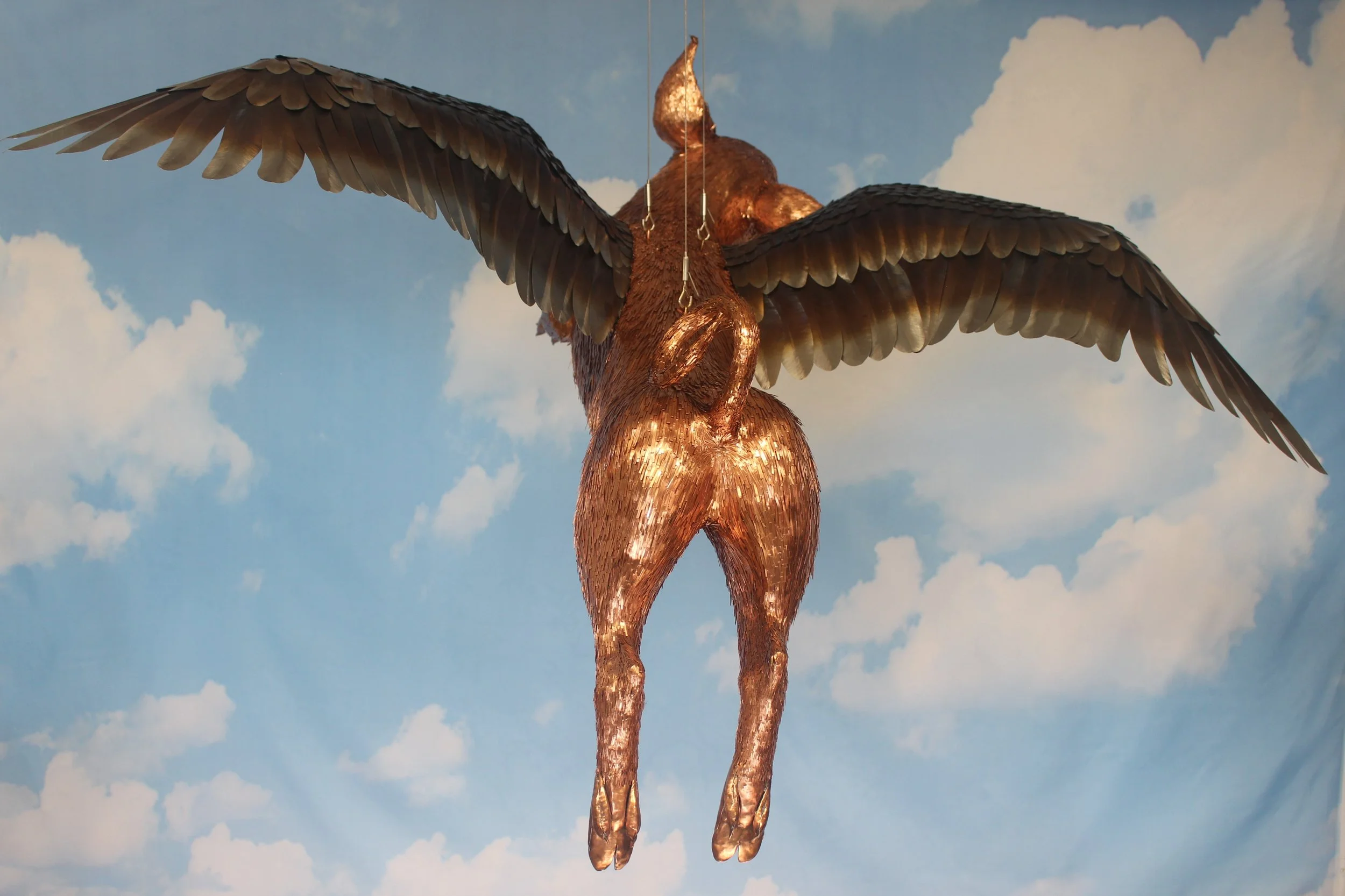 "Skypig" copper flying pig sculpture, back view