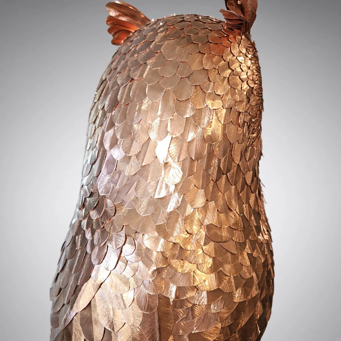 Back view of the copper owl sculpture