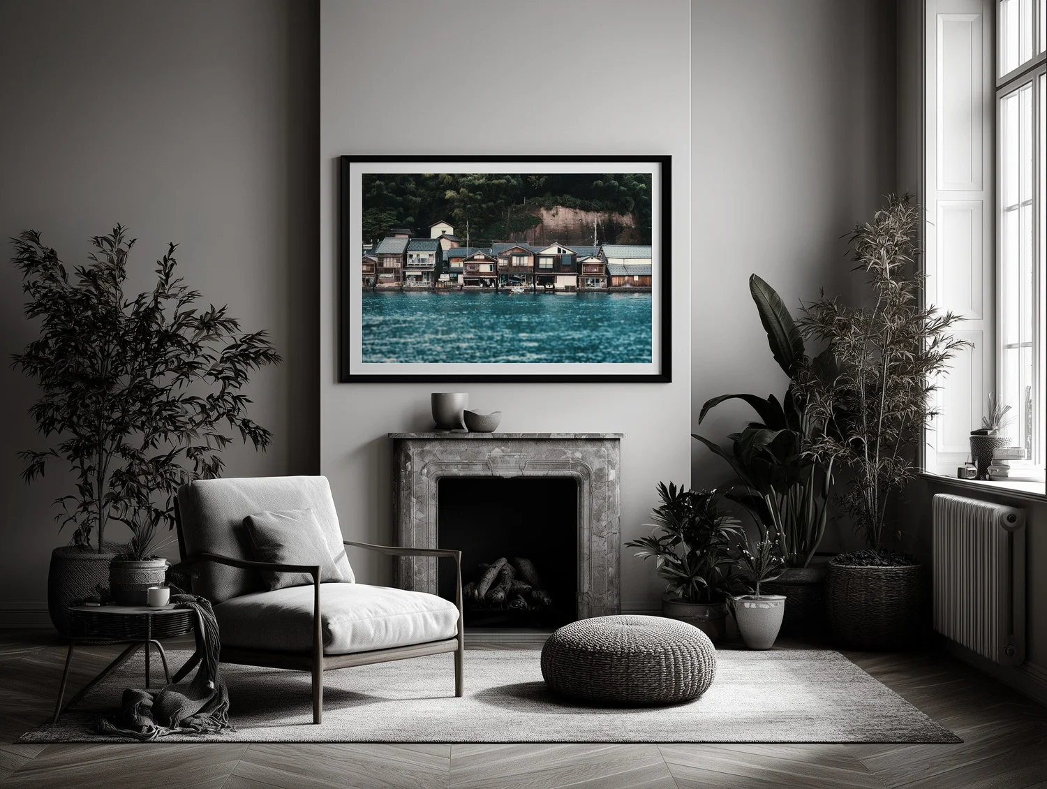 Room mockup of the full-colour Ine Bay boathouses photograph in a black frame above a fireplace.