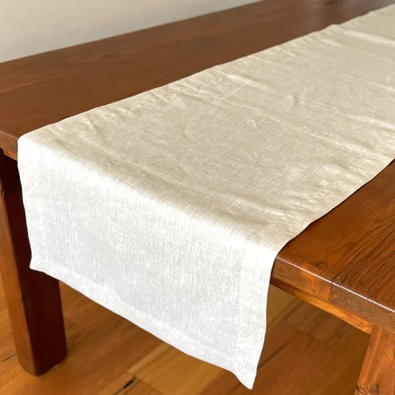 Table-Runners-French-Linen-Natural_d484e6c6-a673-403a-8c1a-89c543337038.jpg.webp