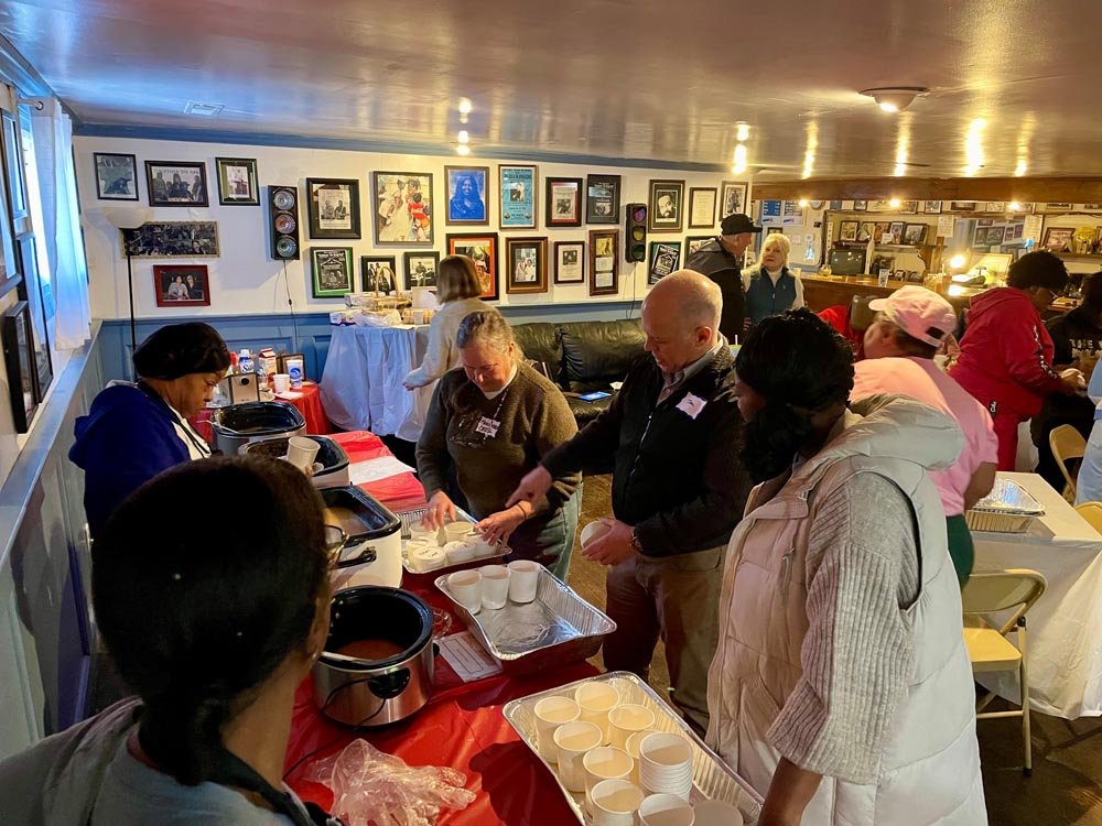 preparing soup MLK Pender & Coward 2025.jpg