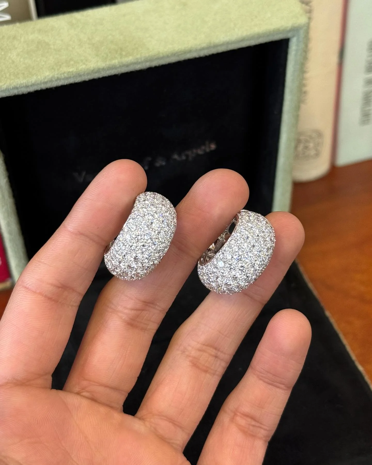 A bold pair of vintage Van Cleef &amp; Arpels 18k white gold and diamond hoop earrings, pav&eacute;-set with 262 brilliant-cut diamonds weighing approximately 16-17 carats in classic bomb&eacute; form. French circa 1990s &mdash; a classic example of 