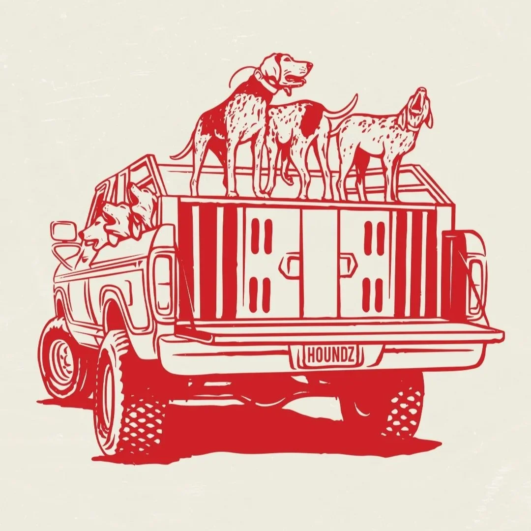 Custom hunting apparel graphic featuring hounds in a pickup truck dog box illustration designed for outdoor lifestyle merch.