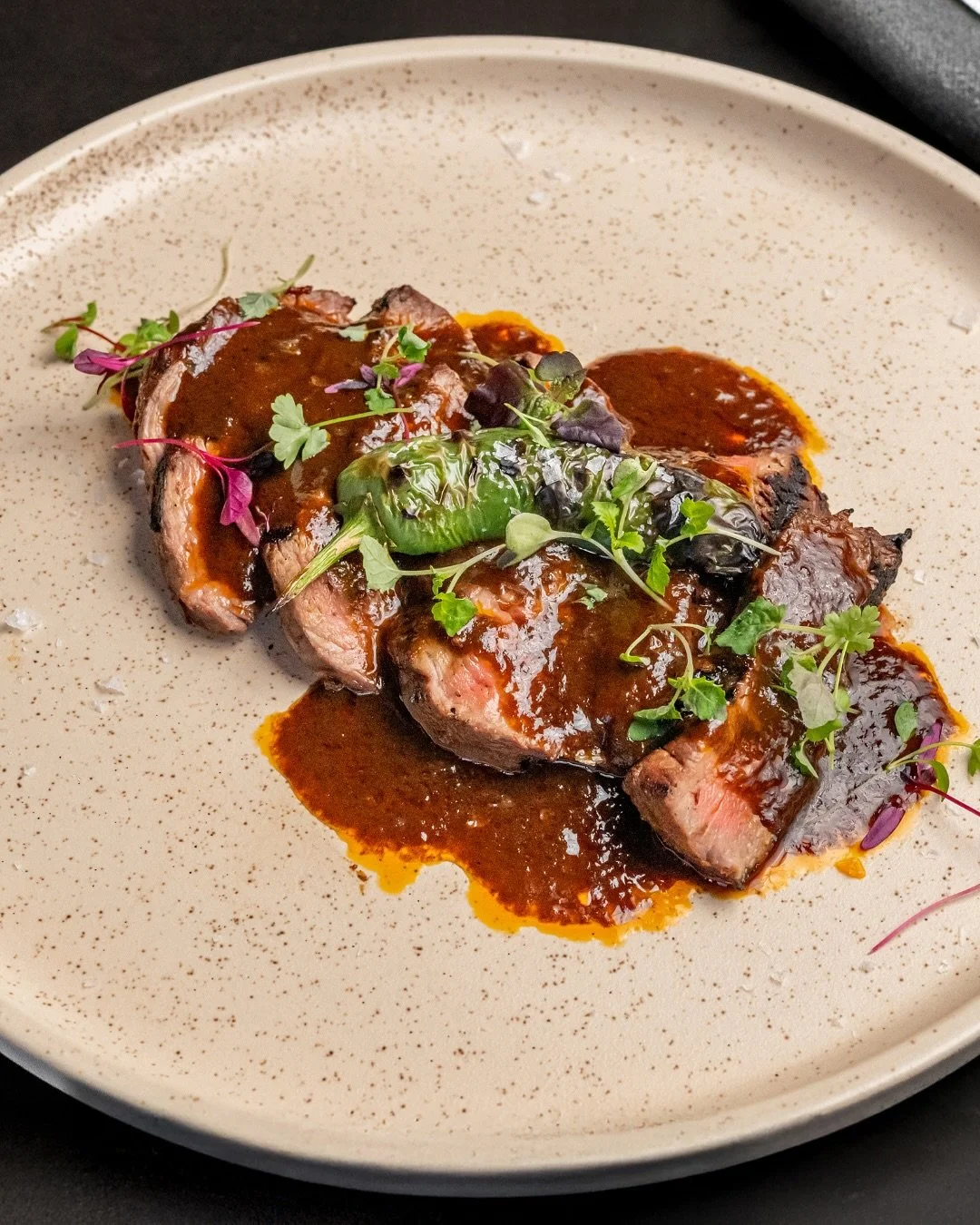 Juicy wagyu rump, dripping with smoky habanero jus and topped with shishito peppers. A dish worth lingering over 🥩🔥 Available &agrave; la carte, on UberEats and as part of the $70 Feed Me menu. YUM! 

mejicosydney #m&eacute;jico #sydneyrestaurants 