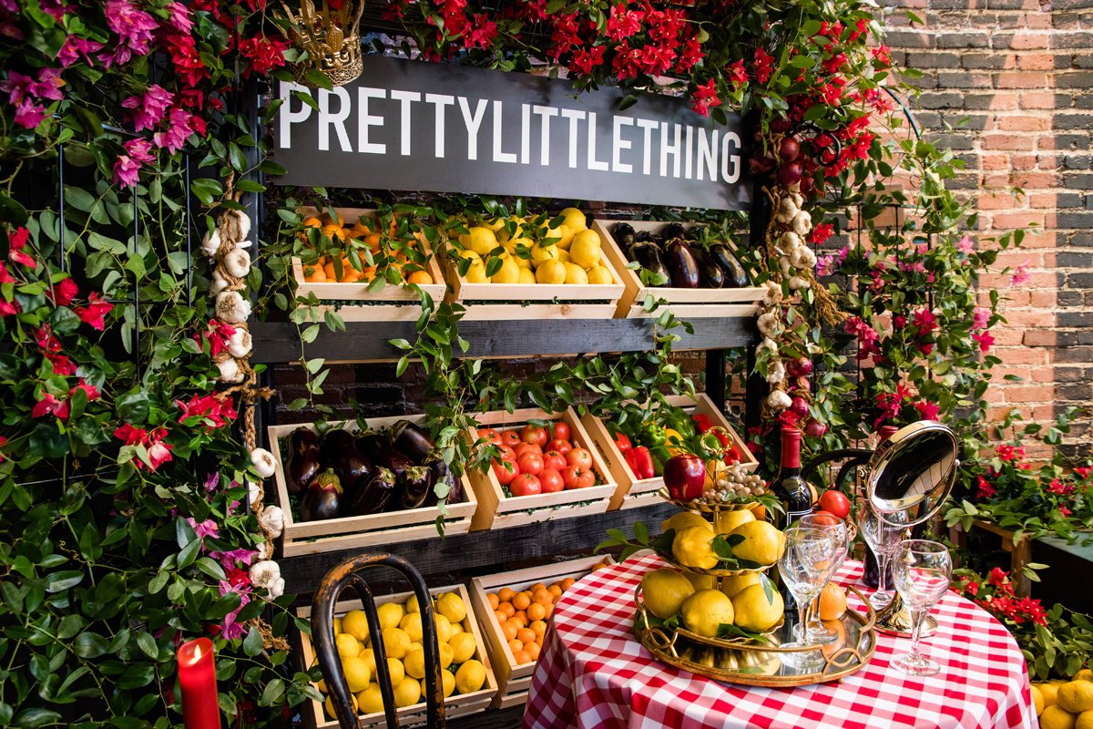 PrettyLittleThing PLT X Olivia Culpo Collection  Celebrity Launch Party table for two.jpg