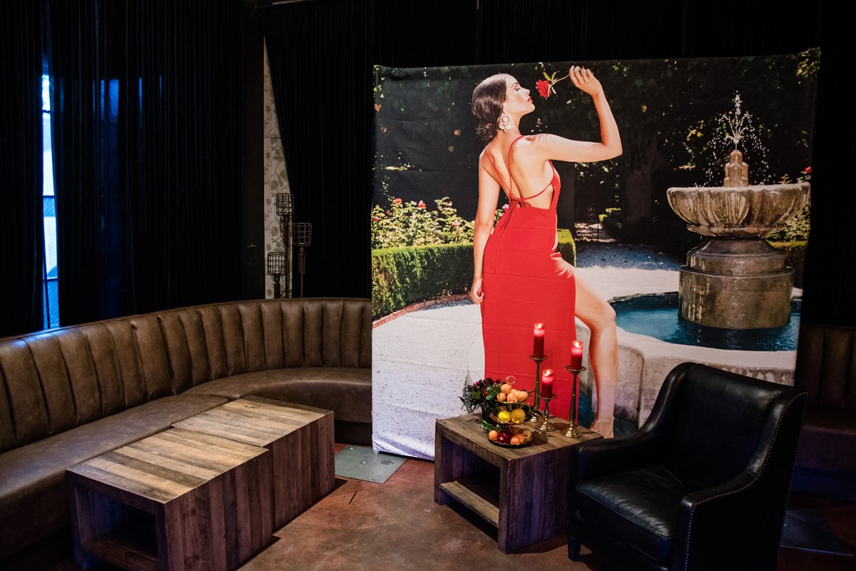 PrettyLittleThing PLT X Olivia Culpo Collection  Celebrity Launch Party large poster of Olivia in red gown.jpg