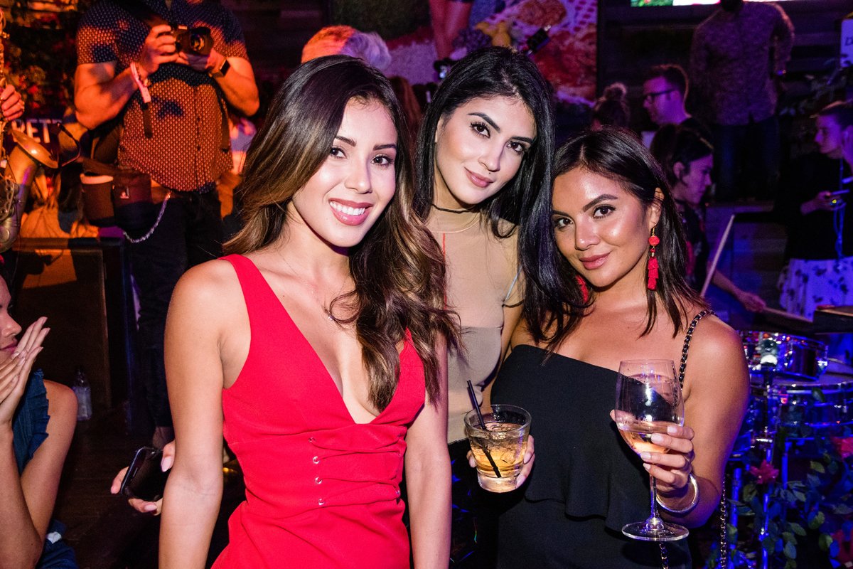 PrettyLittleThing PLT X Olivia Culpo Collection  Celebrity Launch Party guests having fun.jpg
