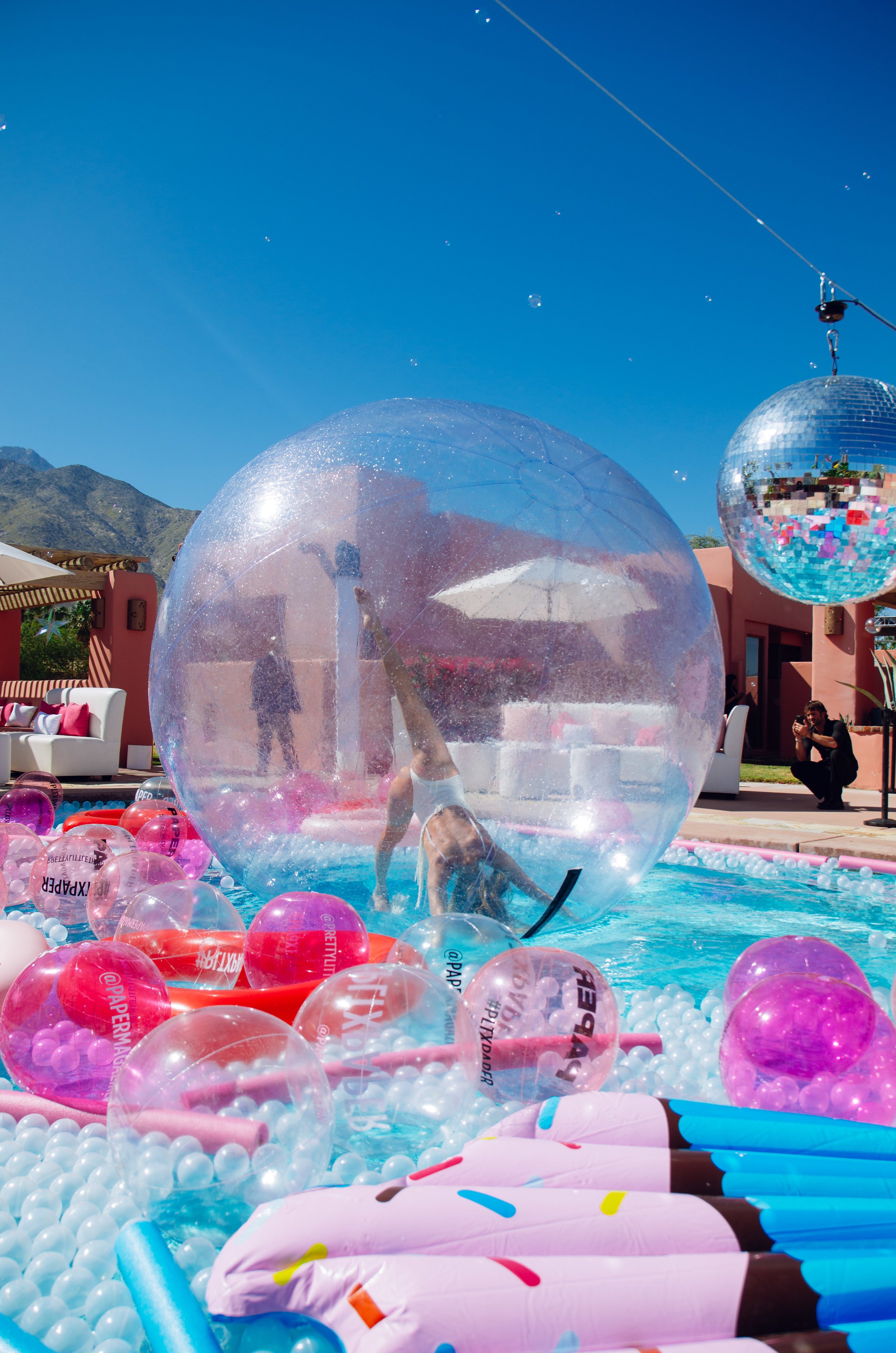 Ultimate Hollywood Coachella Poolside Party entertainer in pool bubble.jpg
