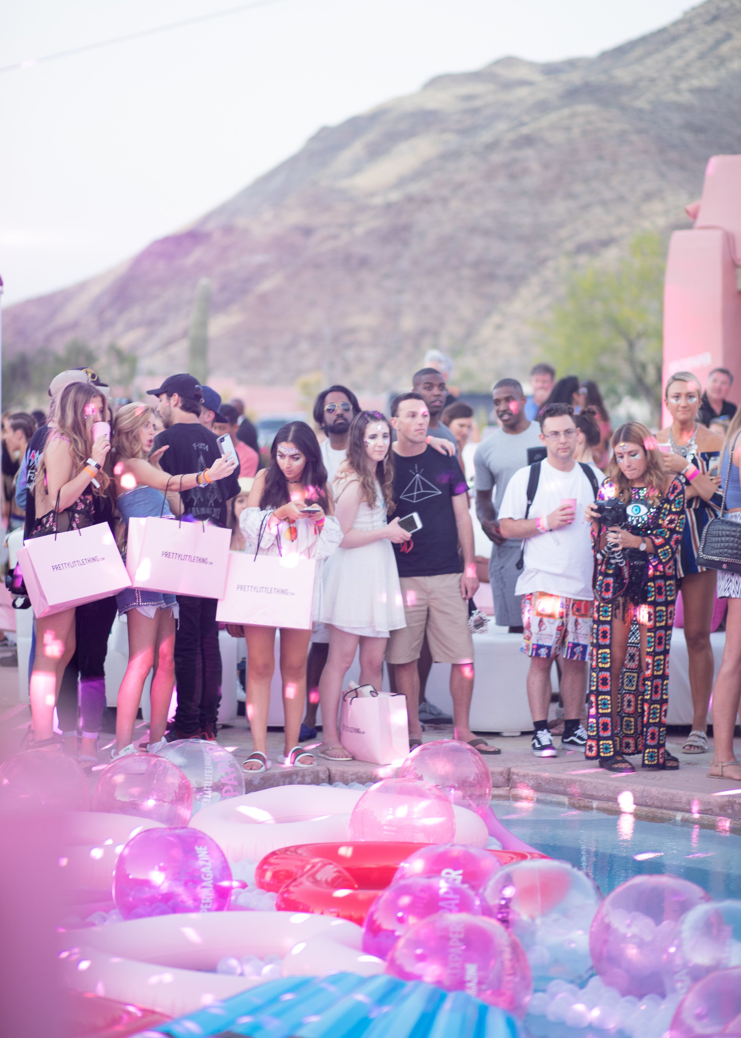 Ultimate Hollywood Coachella Poolside Party guests standing poolside.jpg