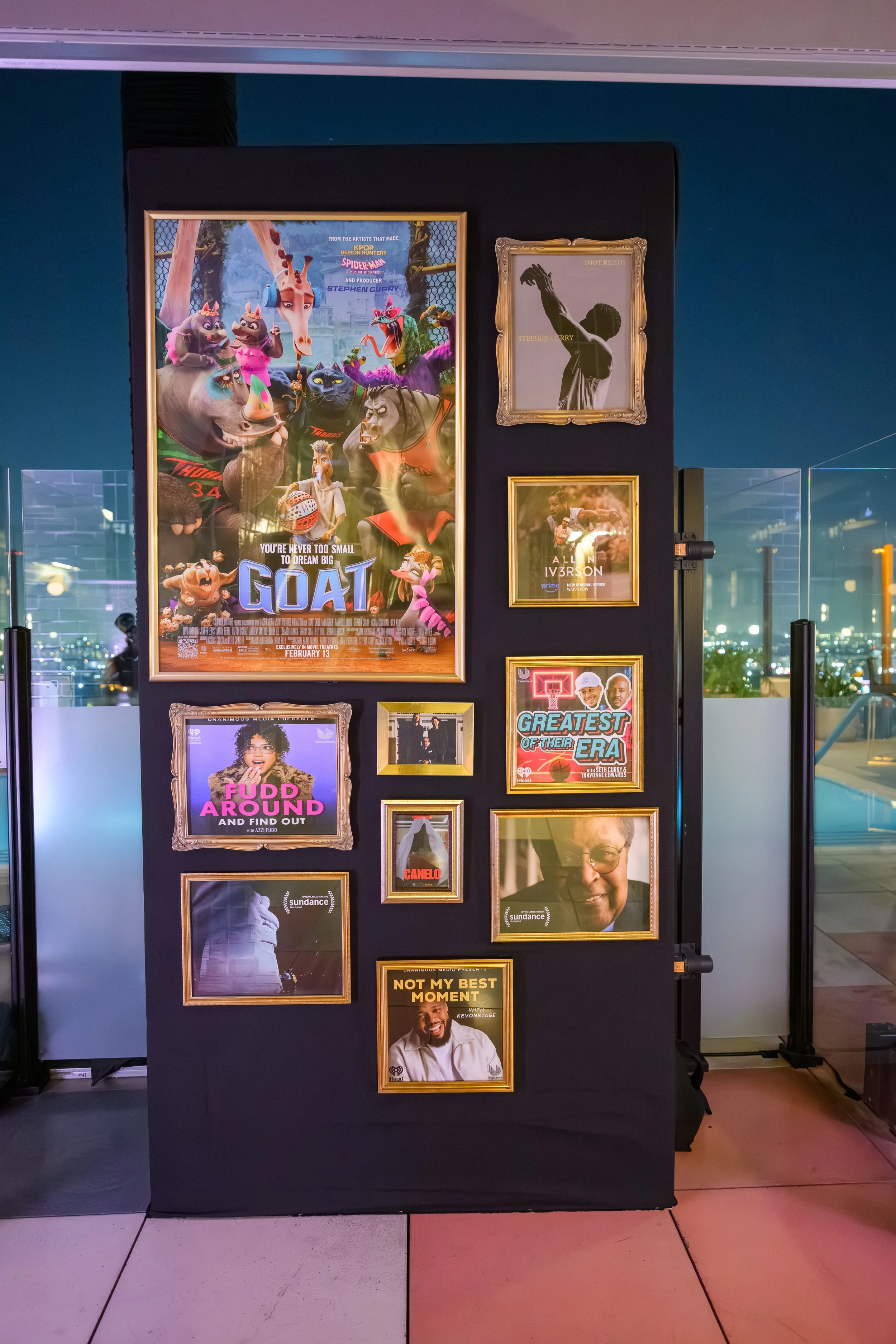 Custom Unanimous Media feature wall showcasing Stephen Curry’s film, podcast, and entertainment projects during the Google Search x Unanimous NBA All-Star Weekend event, produced by Loriann Serna and The Wife of the Party.