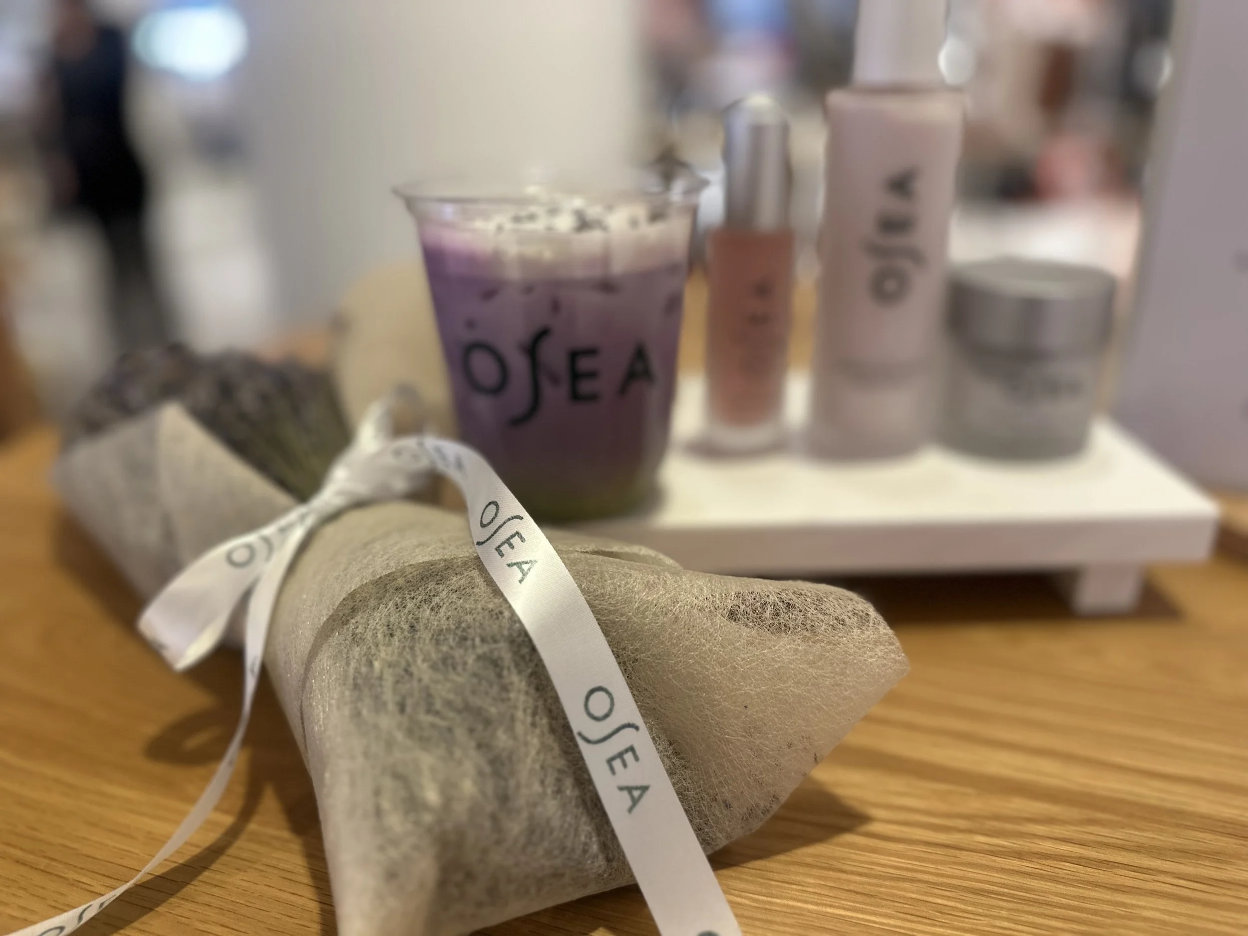 OSEA Dream Glow skincare display with lavender styling and elevated product presentation designed by Loriann Serna of The Wife of the Party.