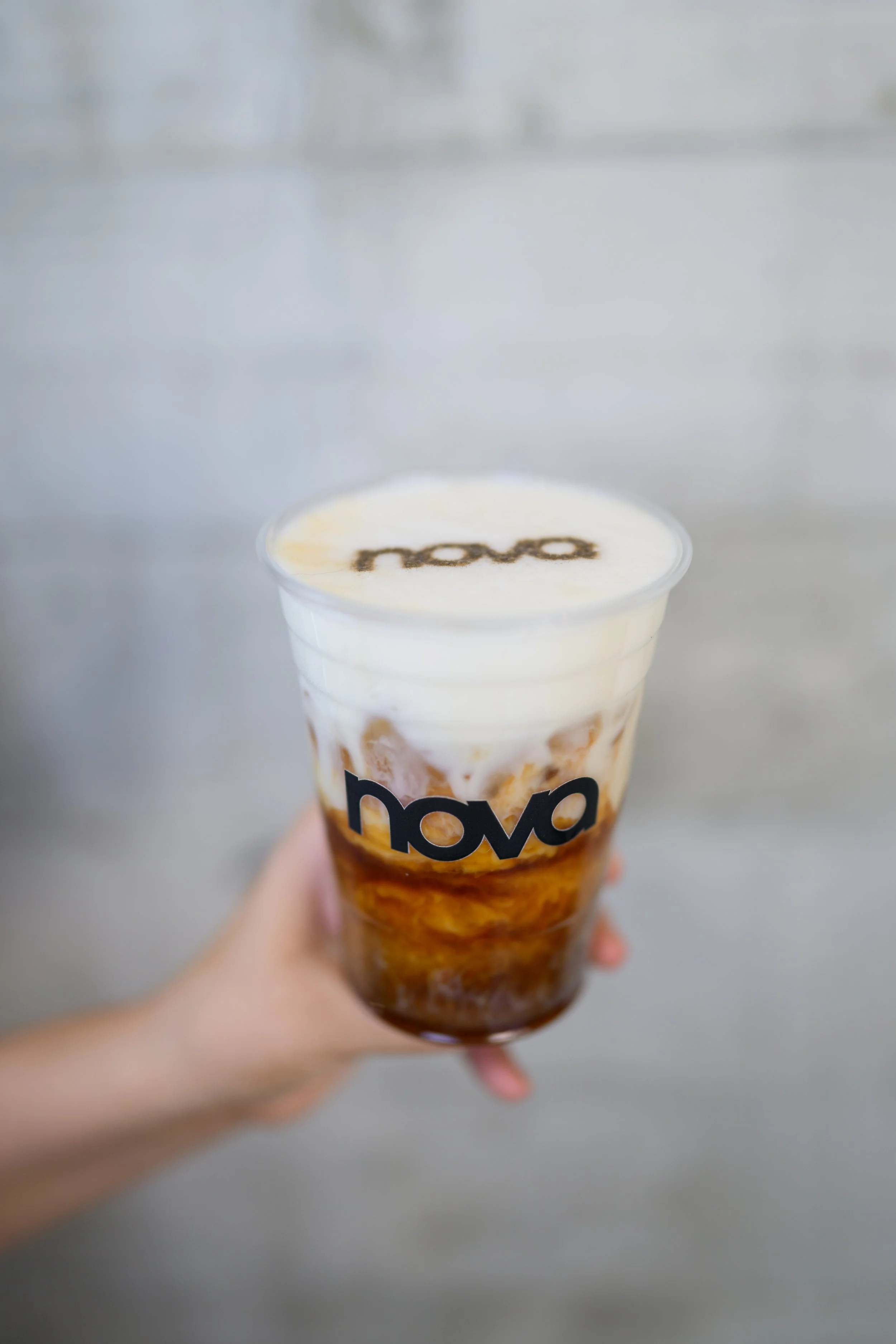 Nova branded iced coffee served to guests at Fashion Nova Nova Fitness launch event featuring lifestyle hospitality elements designed by Wife of the Party