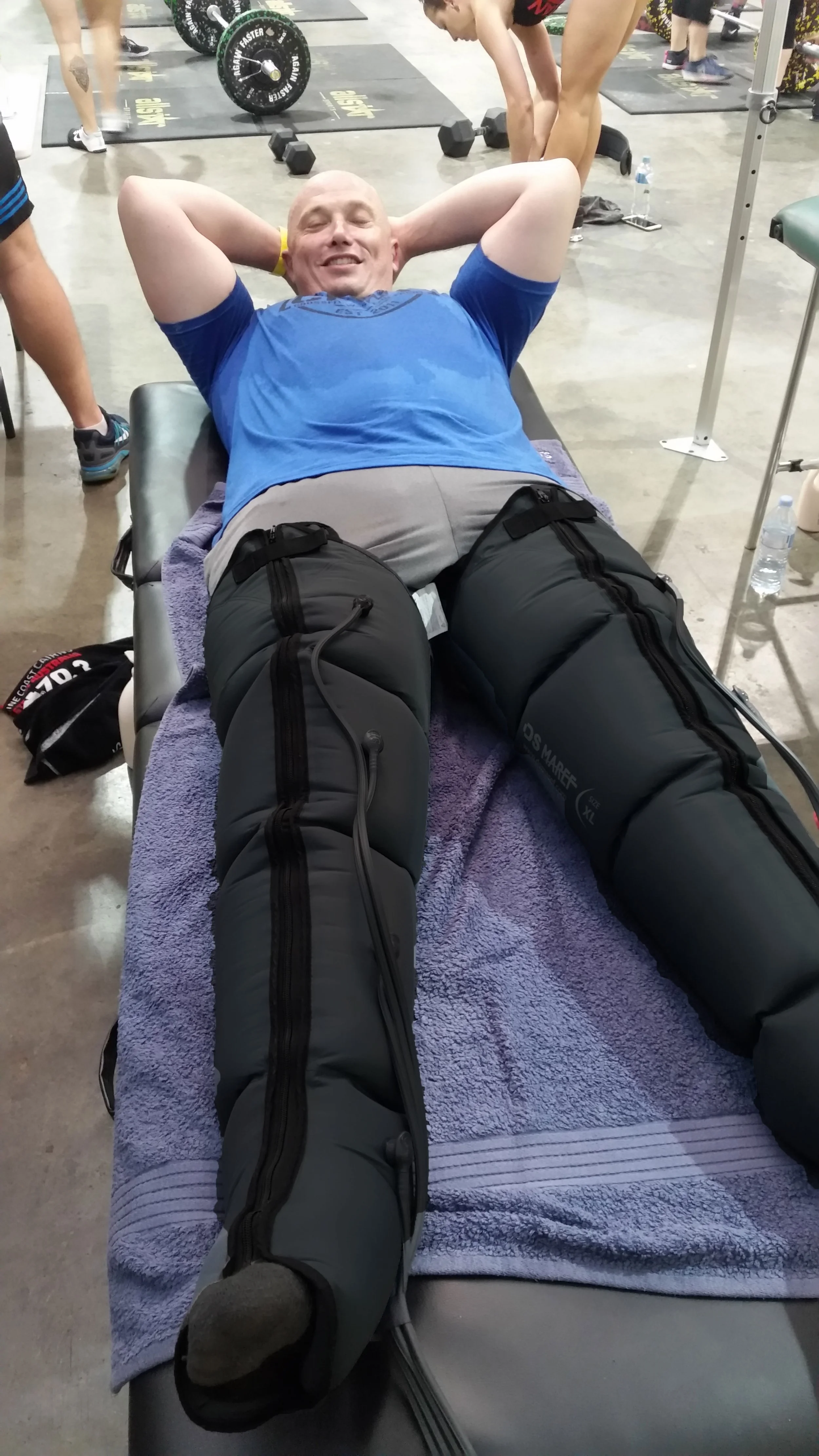 Compression boots in action used by Sports Chiropractors Association post event